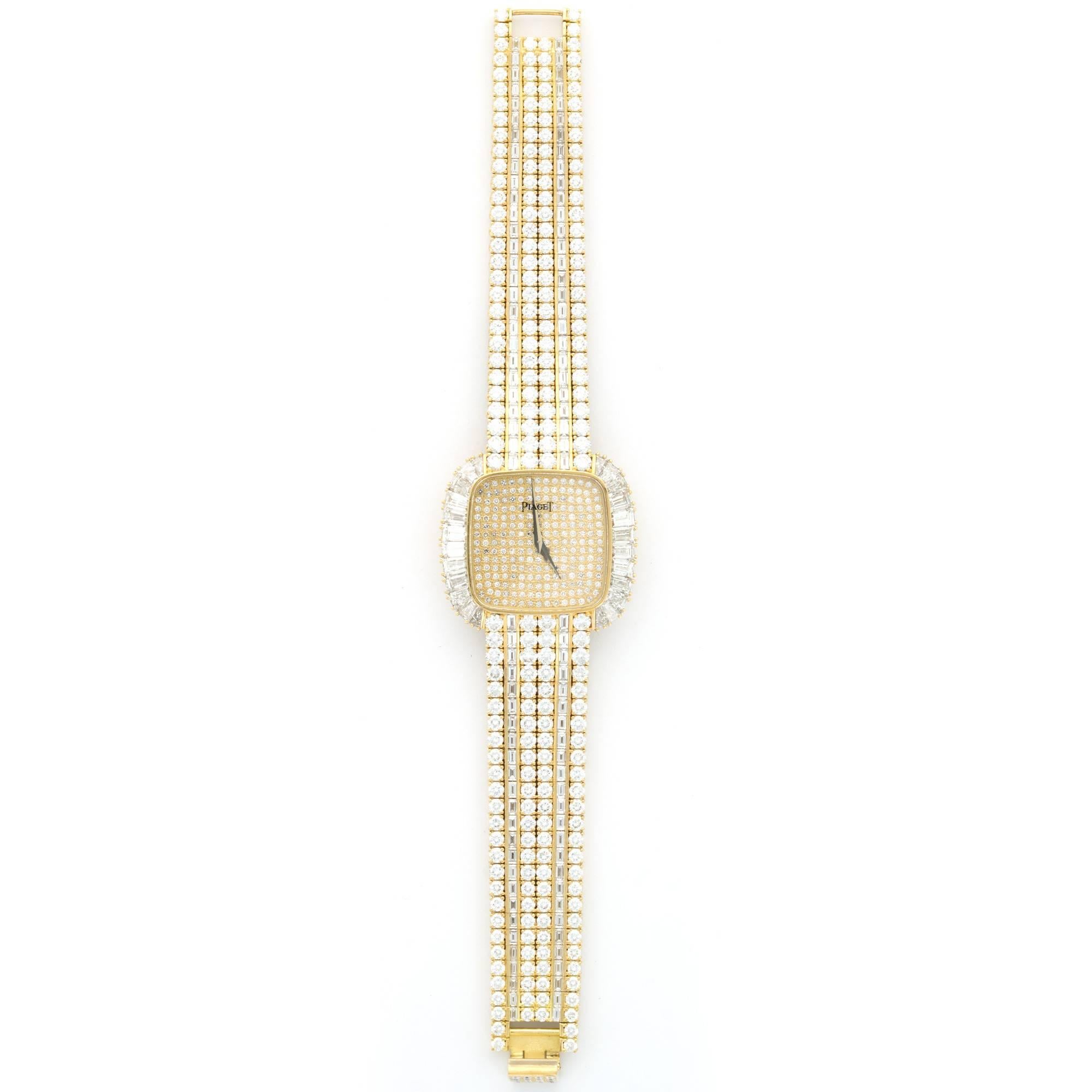 A Large Yellow Gold Baguette and Brilliant Diamond-Set Bracelet Watch by Piaget. An Extraordinary Piece from one of the best jewelry watch company's.

Reference 77280. 

Circa 1980's.