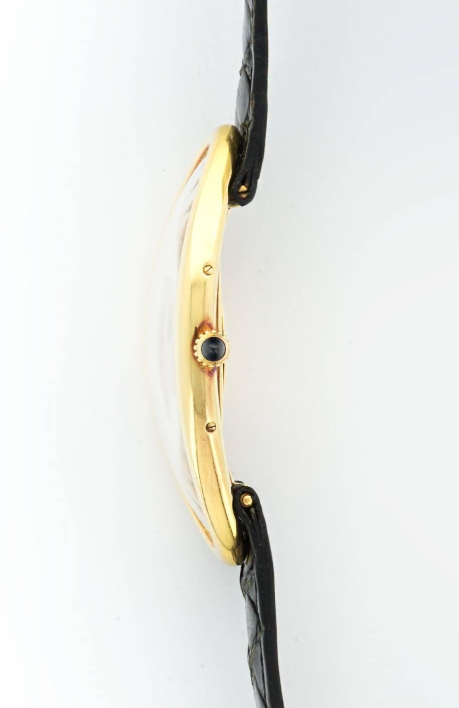 An rare oversized Cartier Baignoire Allongee Maxi in 18k yellow gold on a strap. 

Manual-Wind. 

Circa 1990's.

