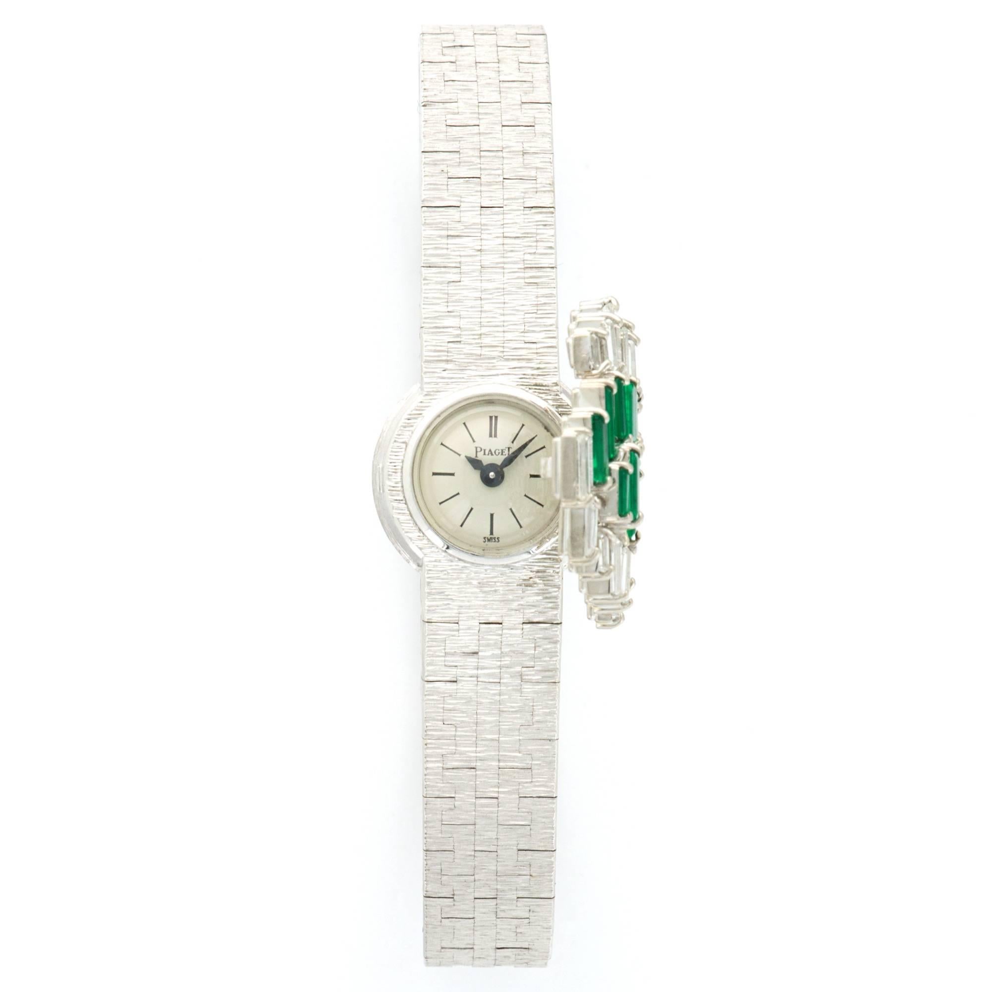 A Beautiful and Delicate White Gold Diamond & Emerald Cover Watch by Piaget.

Circa 1970s.

Manual Wind Movement.

Ref. 3288