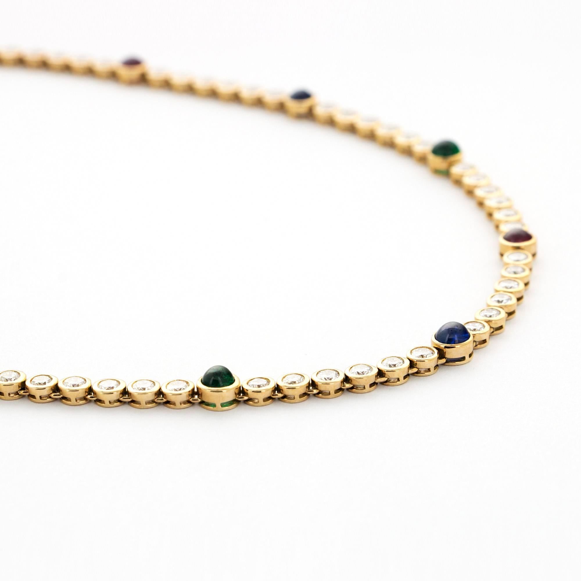 A 1980's Straight-Line Diamond Necklace with Cabochon Rubies, Emeralds and Sapphires in 18k Yellow Gold.  Signed 
