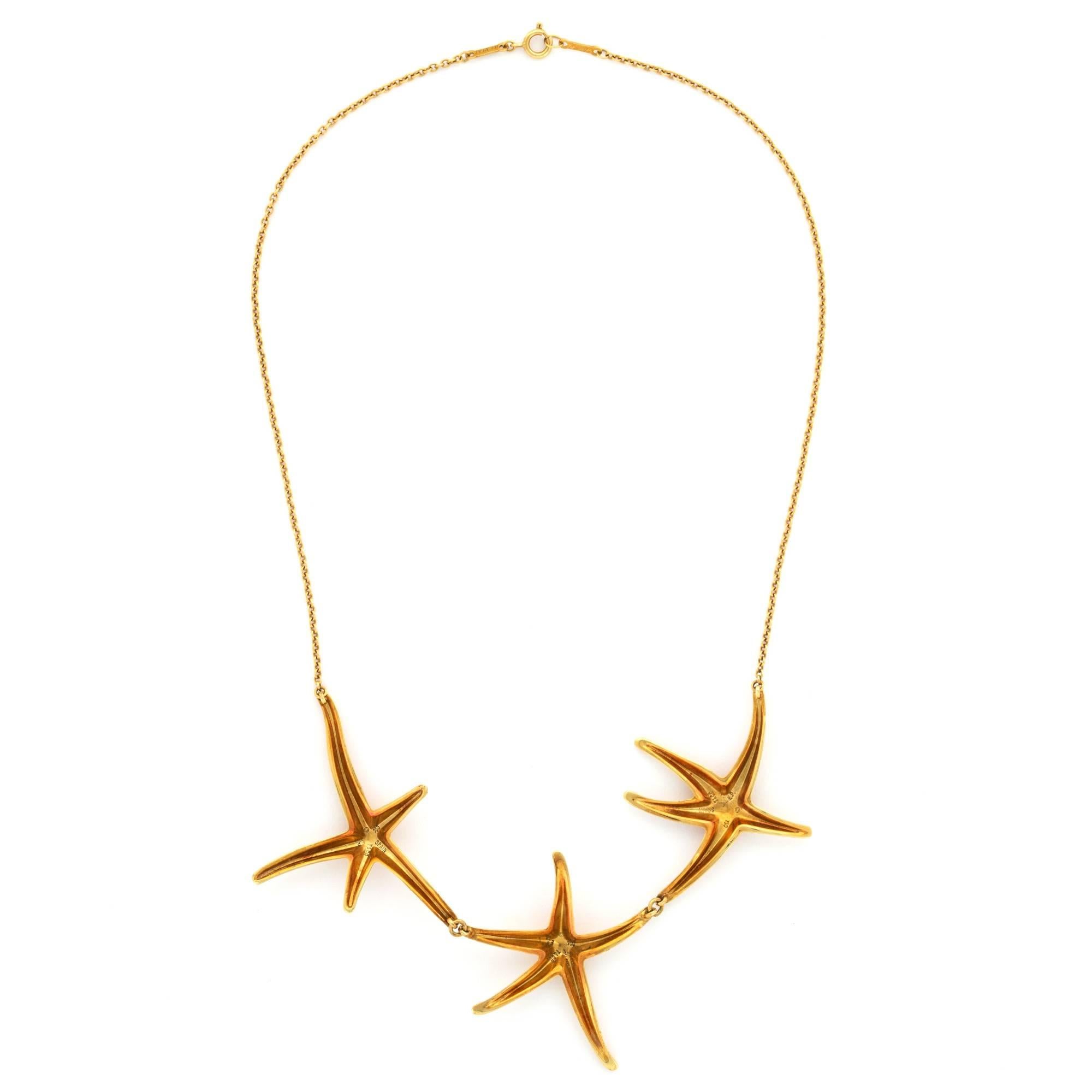 An 18k Yellow Gold Necklace with Hanging Starfish Design by Tiffany & Co. Designed by Elsa Peretti for Tiffany. 