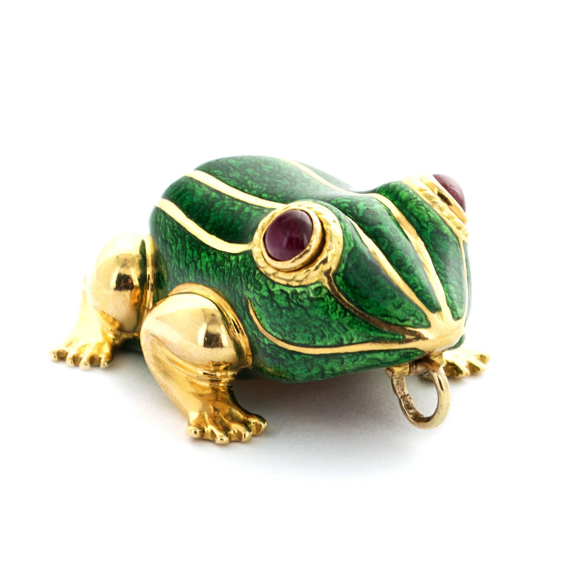 A 1970's 18k Yellow Gold Frog Pendant with Green Enamel and Ruby Eyes. Circa 1970's. 42mm Diameter. 