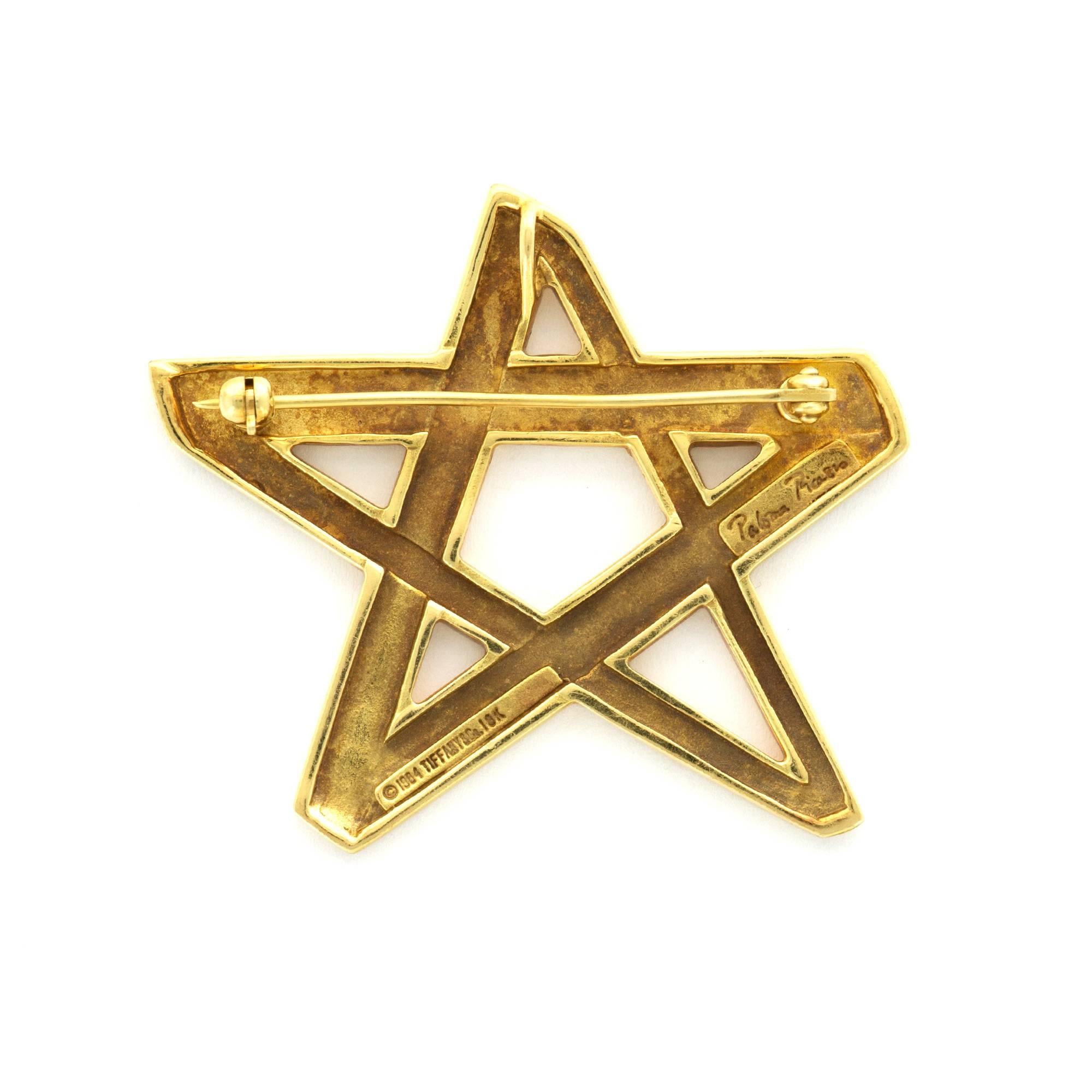 An 18k Yellow Gold Star-Design Brooch by Tiffany & Company. Designed by Paloma Picasso. 43mm Diameter. Signed "Tiffany & Co. & Paloma Picasso"