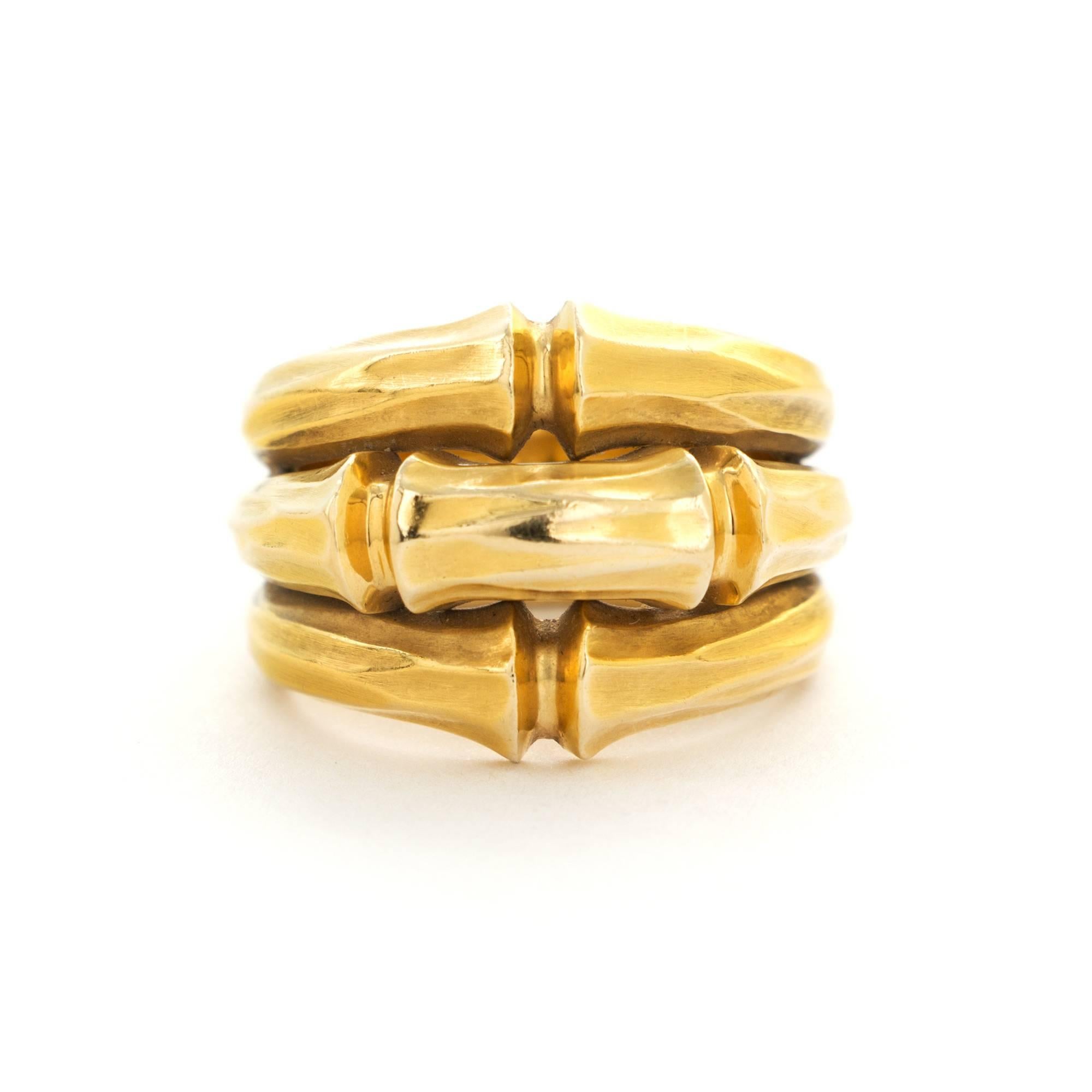 An 18k Yellow Gold Bamboo-Design Ring by Cartier. Made in France. Size 56. Signed 