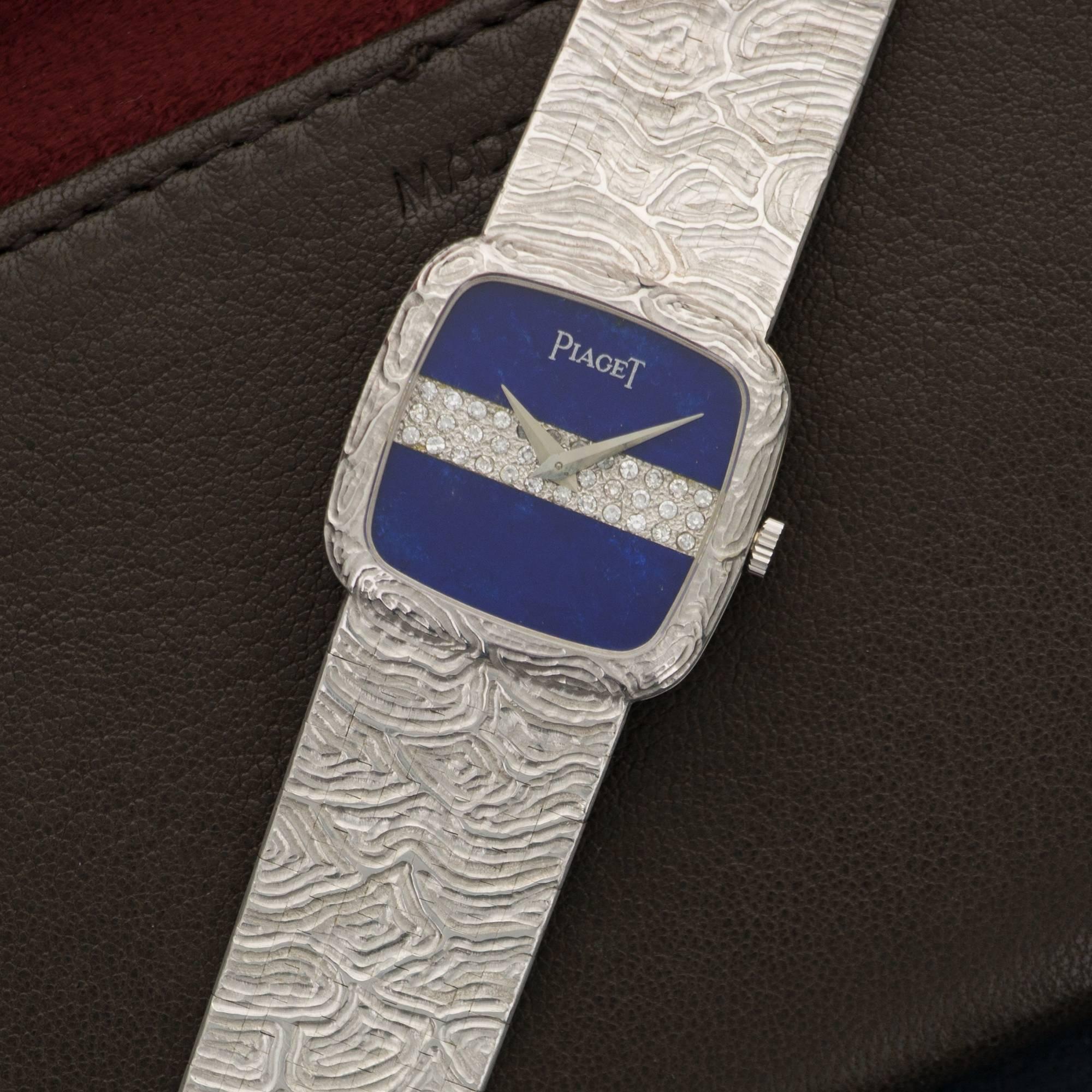An 18k White Gold Wristwatch with Lapis Lazuli and Pave Diamonds. Model 9902. Circa 1970's. Case measures 23mm. Bracelet Length is 185mm. 