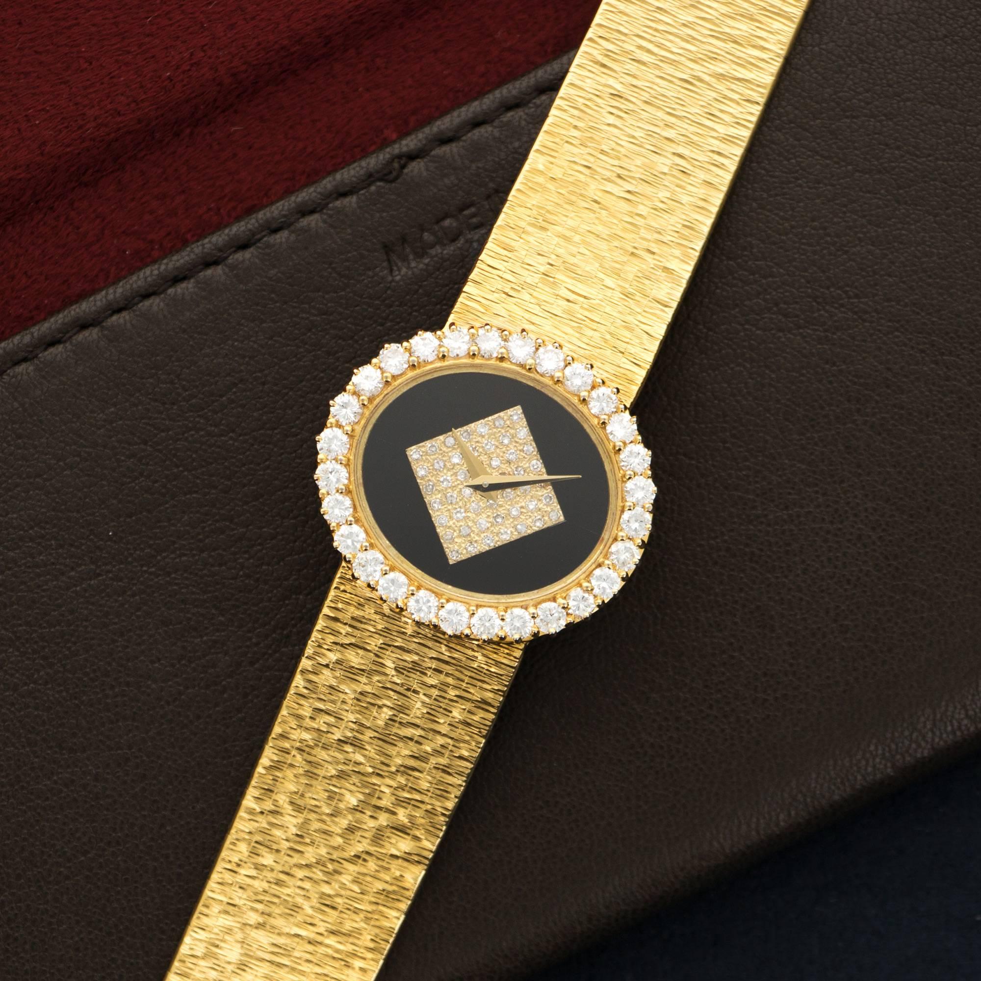 An 18k Yellow Gold Pave Diamond & Onyx Watch by Piaget. Circa 1970's. All Original. 