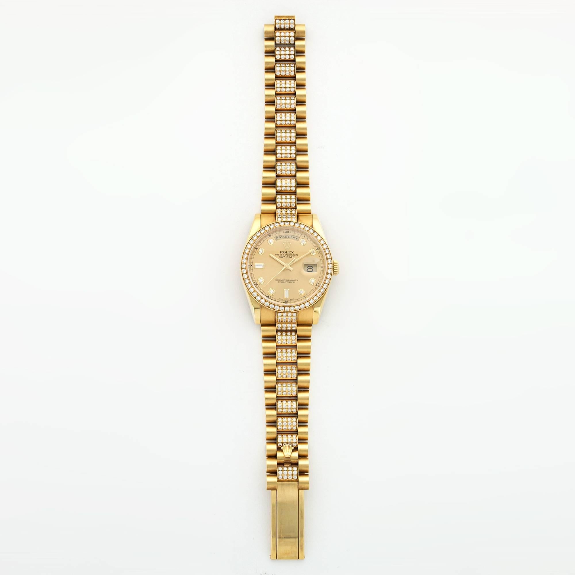 An 18k Yellow Gold Rolex Day-Date Model with All Original Diamonds. Model Number 118348. 36mm Case Diameter. Automatic Movement. In Like New Condition. 