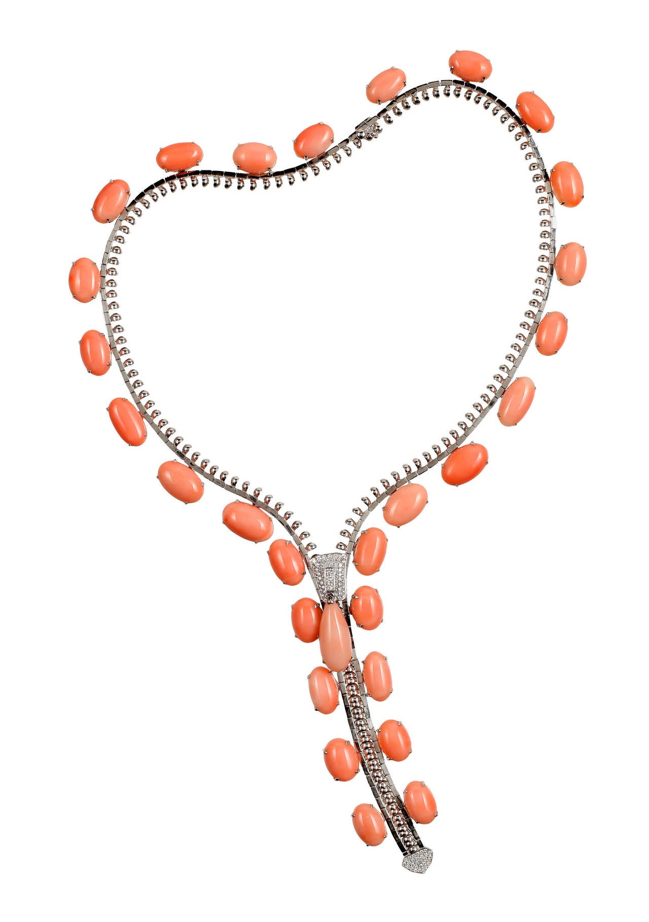 The necklace is fully functional Zipper in 18 KT Whitegold, adorned with 29 Cabochons of Natural Angel Skin Coral, 79.49 ct., and with 100 Diamonds, 1.28 ct.,  TW/ vsi - si, mounted in 18 KT White gold. The Diamonds are set on the slider and at the