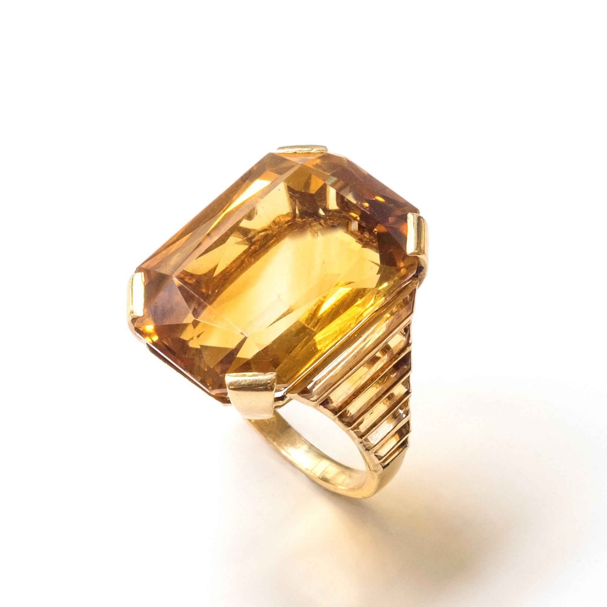 Impressive gold and citrines cocktail ring by Rene Boivin made in 1935. 

Sizes : 
48 1/2 EU  
4 3/4 US

Certificate from Madame Françoise Cailles

René Boivin is a signifiant Parisian designer and engraver. After René’s early death in
