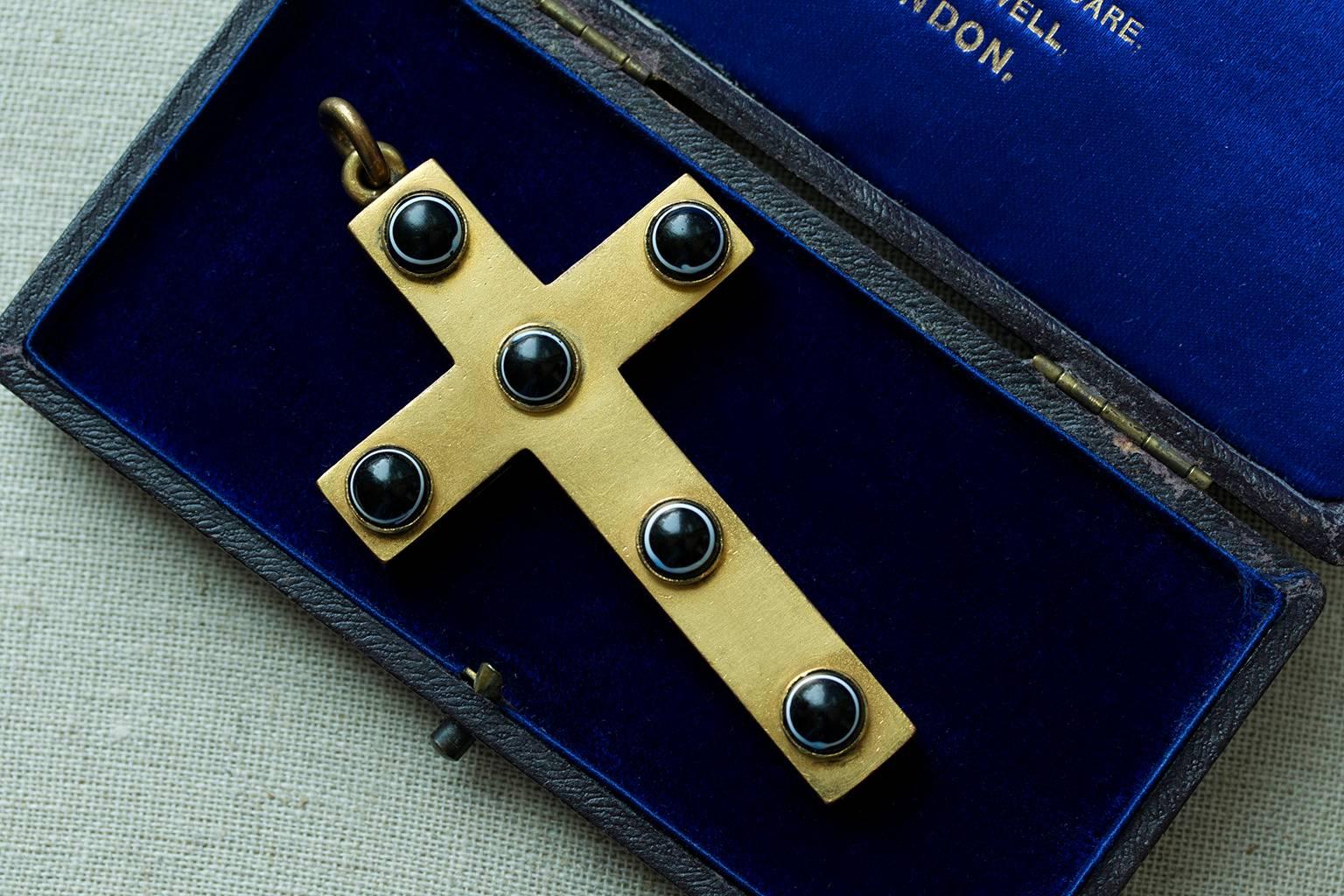 A large Victorian bullseye agate cross. The cross is gilt metal, and measures approximately 3