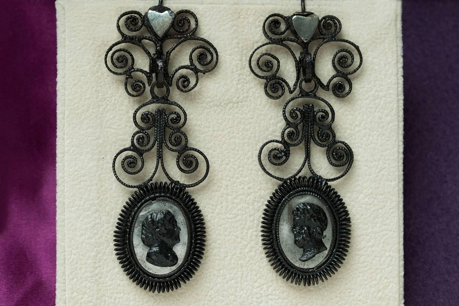 A stunning pair of early 19th century Berlin iron earrings. 

Berlin iron jewelry was developed in Germany in 1806. The jewelry was created to support the fight against Napoleon I in the Prussian war of Liberation (1813-1815). Citizens donated gold