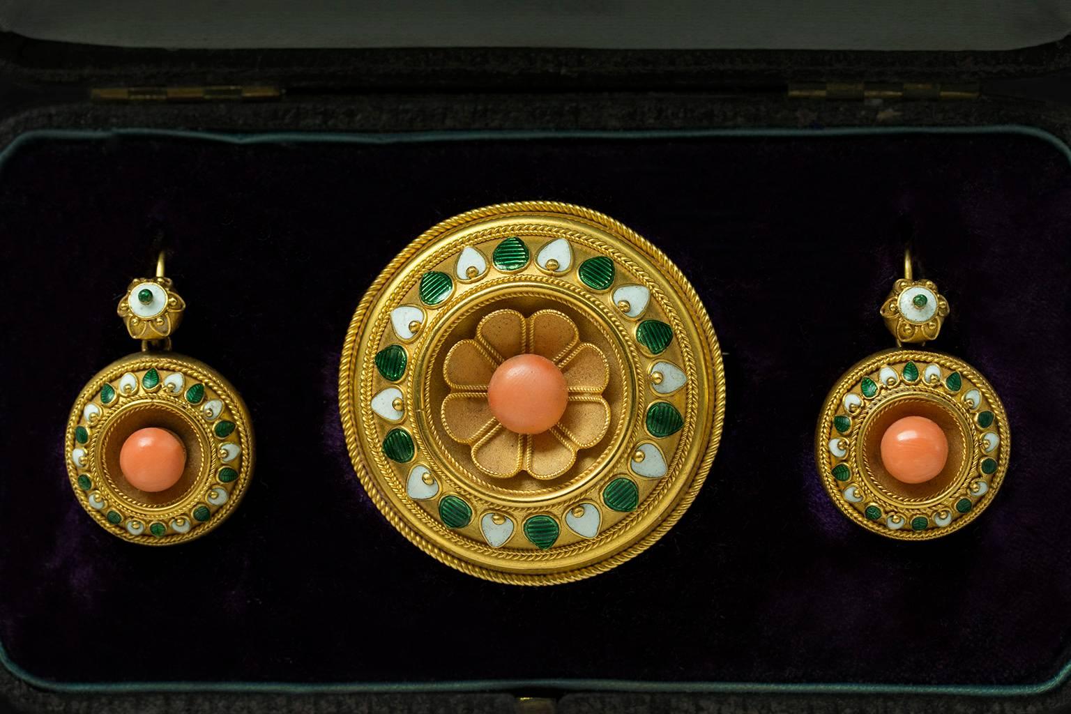 C.1860. A stunning mid-Victorian coral and enamel brooch & earrings set. This high quality set shows beautifully done granulation and rope work details in gold. The rich 18k yellow gold makes a gorgeous harmony with green and white enamel work along