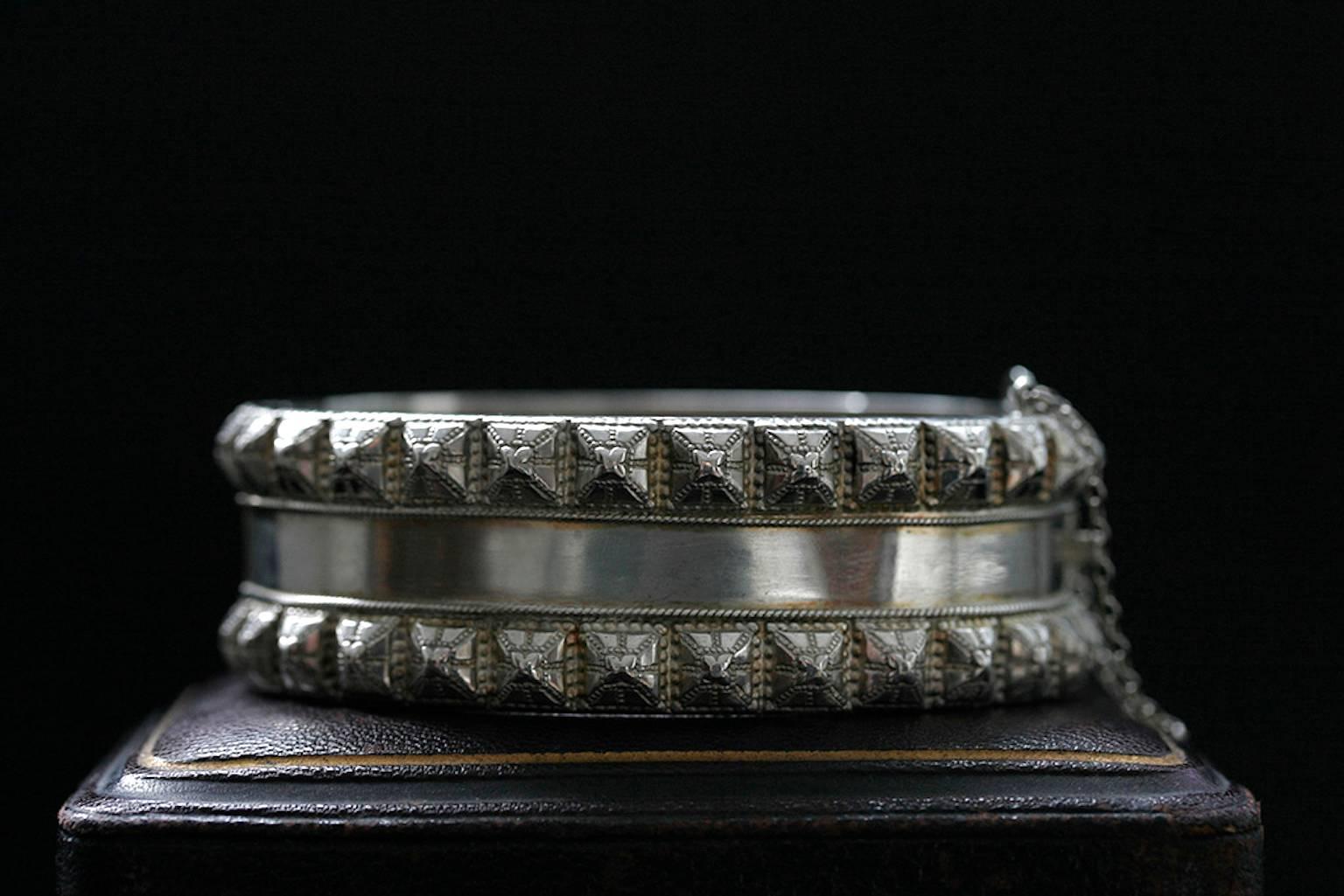 This English Victorian sterling silver bangle is hallmarked in Birmingham in 1882. It is a 135 year old Victorian piece that has such a modern look with timeless design. The bangle is comfortable on the wrist, and fits an average size. 
Some minor