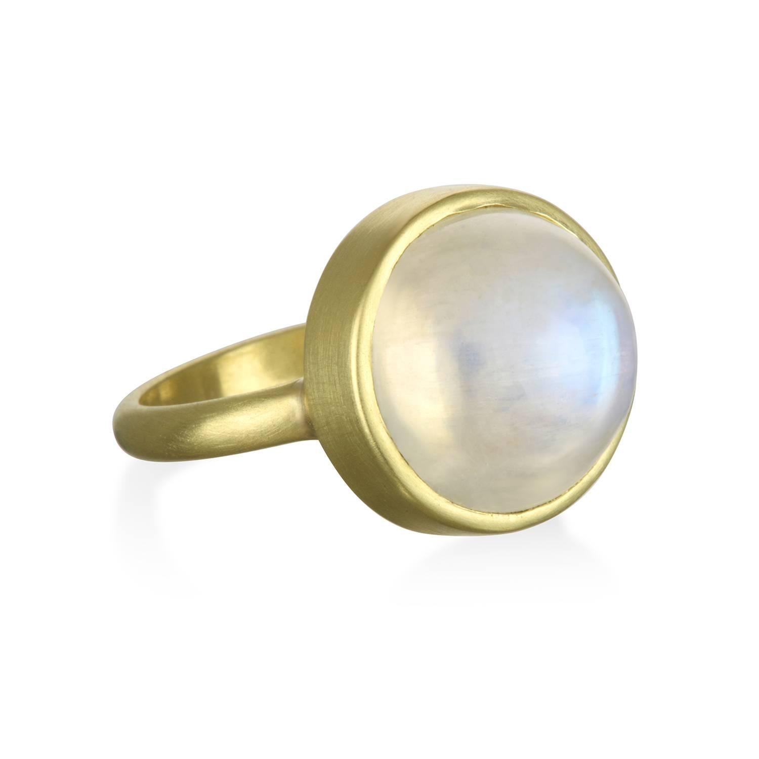 Handmade in 18k green* gold, set in a clean gold bezel with a simple half round band, this is at once classic and modern and so easy to wear!  15mm wide, Moonstone is 13.50 carats.  Shank is 2.5mm half round.  Size 7.  This ring can be