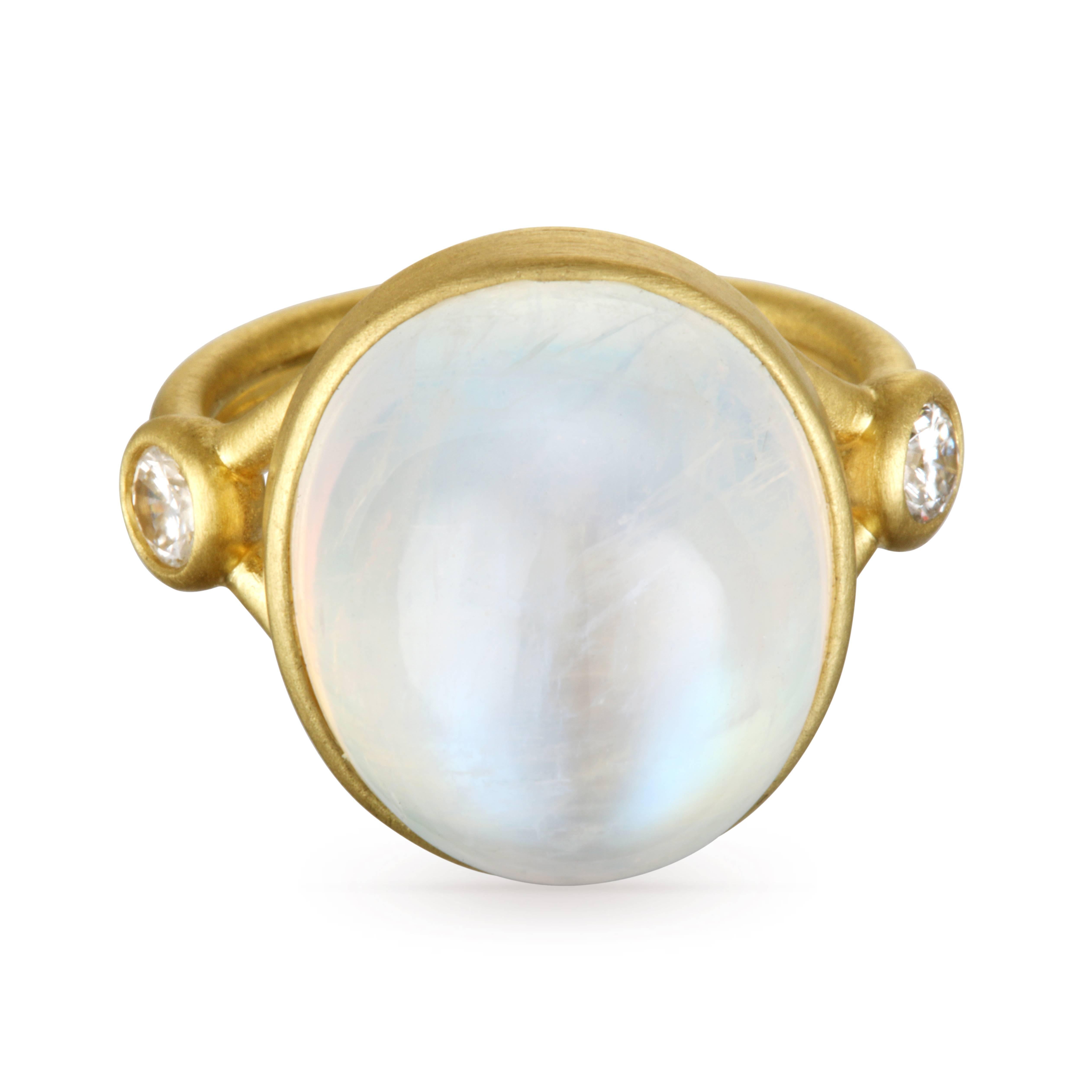 One of a kind, elegant and bold handmade ring in 18k green* gold.  The moonstone is cushion shaped, bezel set with white, round brilliant cut diamond accents on a split shank band.  Moonstone is 18.20 carats.  Diamonds are .24 carats total weight, G