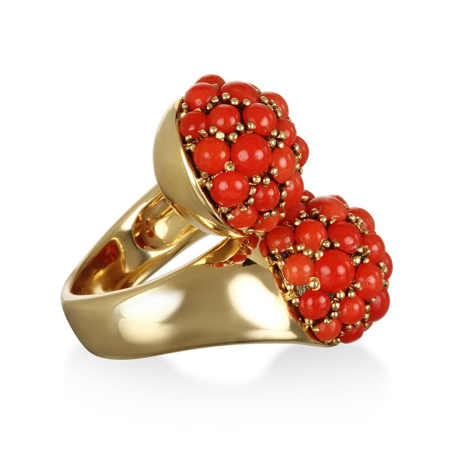 Beautifully crafted in 18k gold, natural red coral beads are pave set to create a double dome cocktail ring.  The off-set design is alluring and flattering on any finger.
Length:  34mm
Height:  14.5mm      
Size 7

