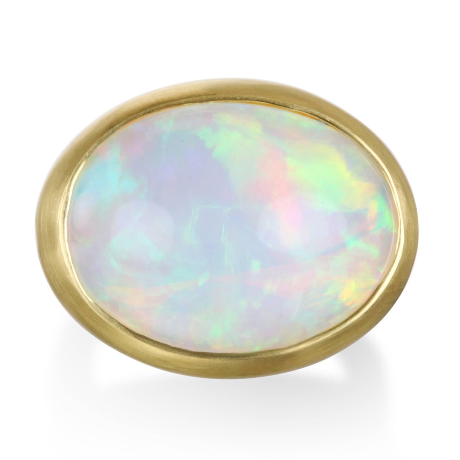 The striking color pallet of Ethiopian Opals is what sets them apart from other gemstones. 
Ethiopian Opals encompass all the splendor of color and texture found in nature. Handcrafted in 18k gold, Faye Kim's bold yet simple and clean design