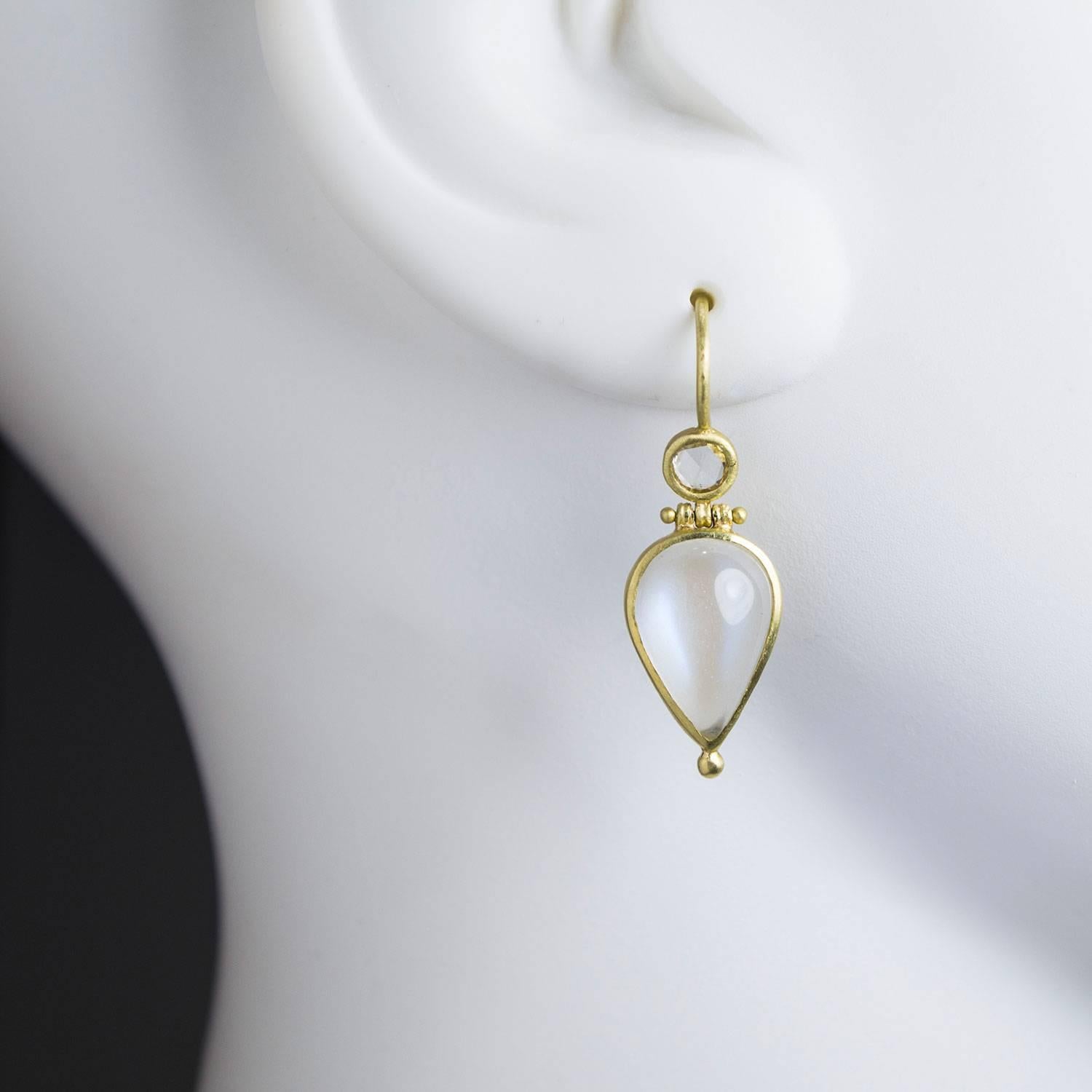 White rose cut diamonds and tear drop moonstones combine beautifully in these 18k green* gold handmade earrings.  The hinge movement enhances the sparkle of diamonds and play of light in the African moonstone drops.  Feminine and bold, the nuances