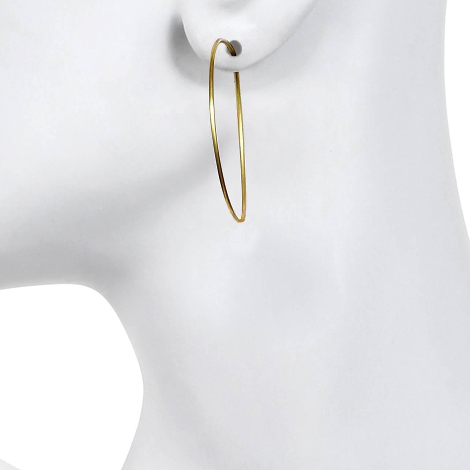 Our most popular hoops handmade in 18 Karat Gold are a must in your jewelry collection. Looks great worn alone as your go-to hoops or with added diamond drops for extra sparkle! Hoop diameter is 1.25 inch. Detachable triple bead diamond drops,