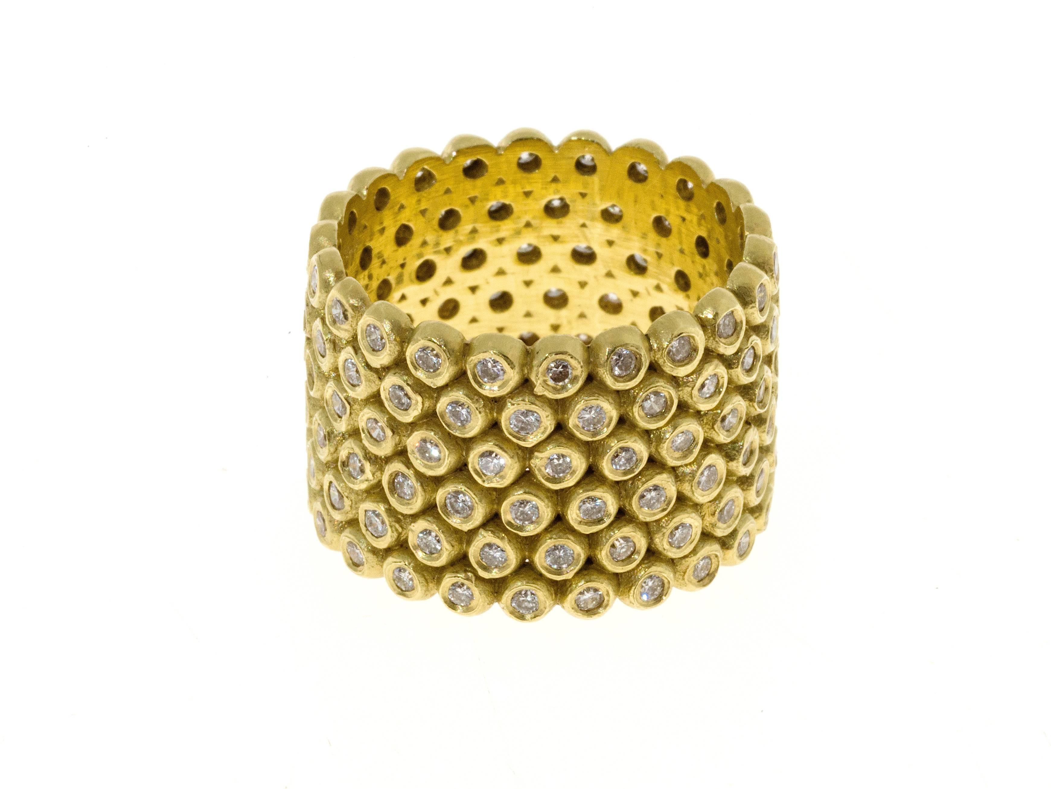 Meticulously crafted in 18k green* gold, this Cigar band is a must have!  
6-rows of brilliant cut diamonds are burnished to create a wide band ring that sparkles and sparkles.
Total weight of diamonds is 1.98 carats. G color, VS quality    