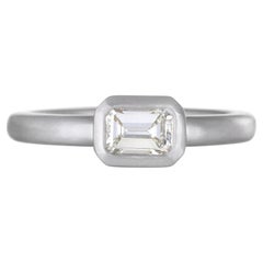 A Kim Platinum 1.50ct Emerald Cut Diamond Bezel Engagement Ring, Size 6.75