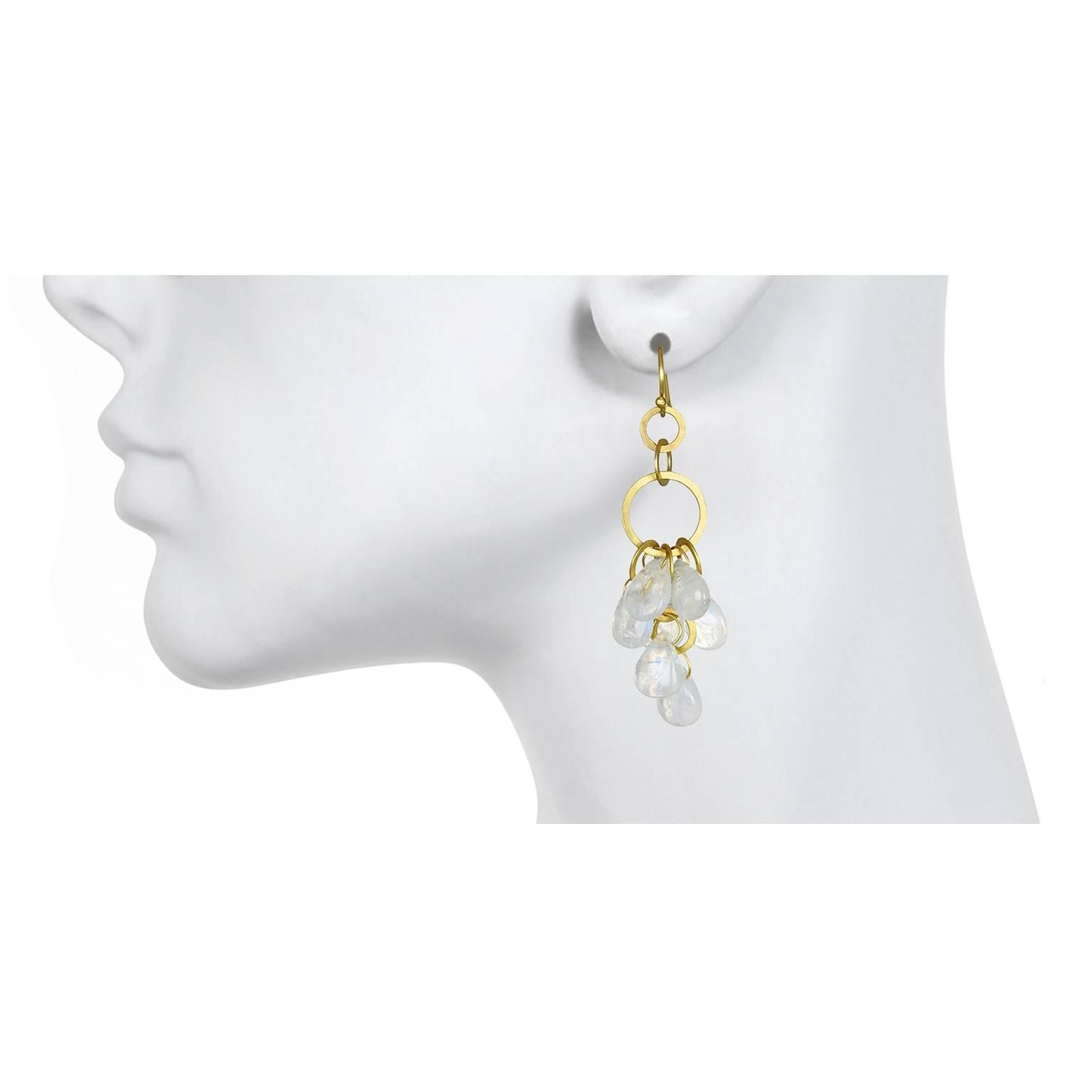 A perennial favorite, Faye Kim's earrings in 18k gold are handmade with shimmering moonstone briolettes.  Fun, and versatile, moonstones are easy to pair with other colors and can easily go from day to evening. French ear wires. Matte