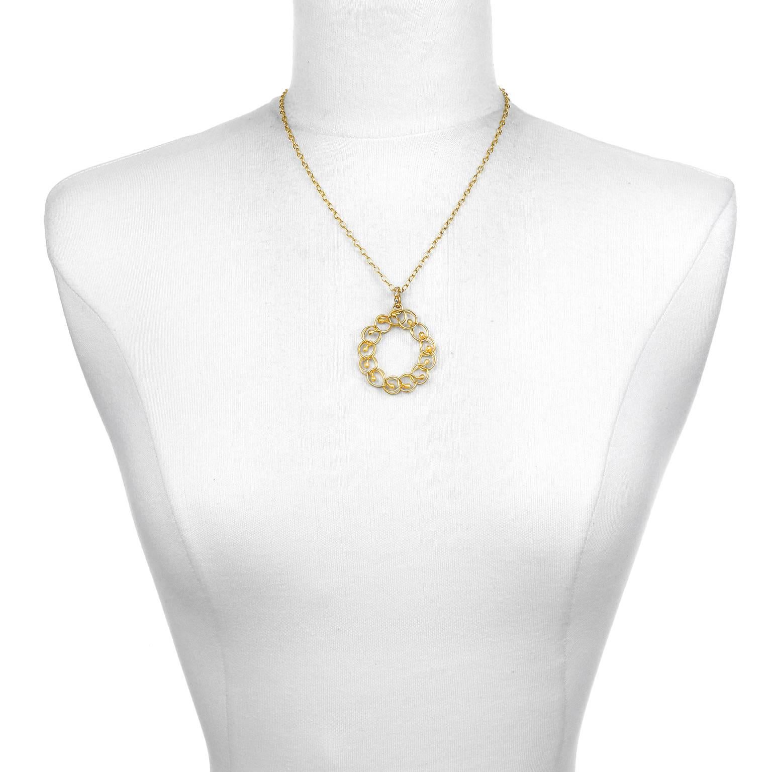 Handwoven in 22k gold, Faye Kim's center ball granulation circle pendant with diamond bail is timeless and stylish.  The chain is also handmade in 22k gold, elevating the classic cable chain to the next level. The look is pure understated