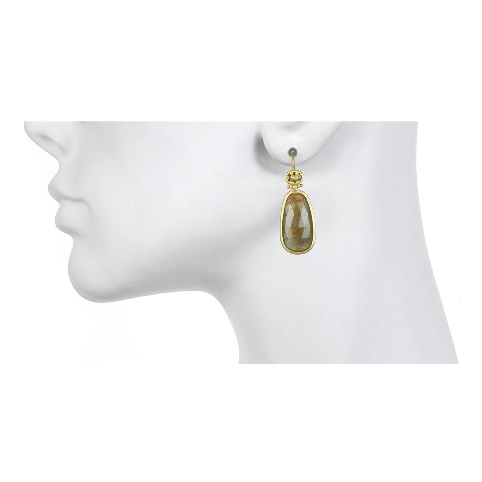 A striking and warm color combination is what makes these sapphire earrings unique.  They feature lightweight, faceted sapphires which give them a big impact but keeps them wearable from day to evening.   Handcrafted in 18k green* gold, rose cut