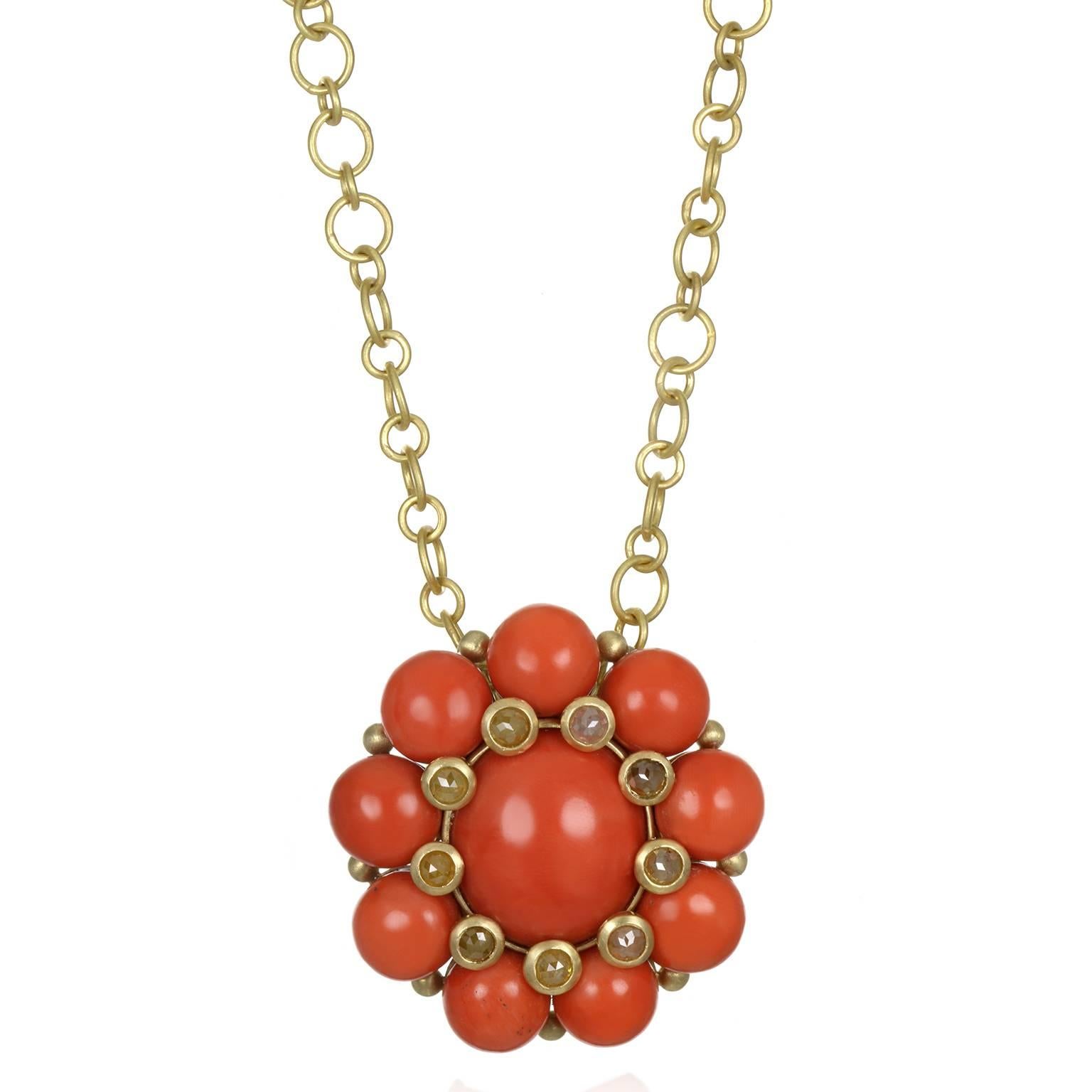 Award-winning Pendant/Brooch.  Designed by Faye Kim and expertly executed, vintage Red Coral beads have been given renewed life combined with raw diamond accents.  A blend between classic and modern, the handmade setting in 18k matte-finished gold