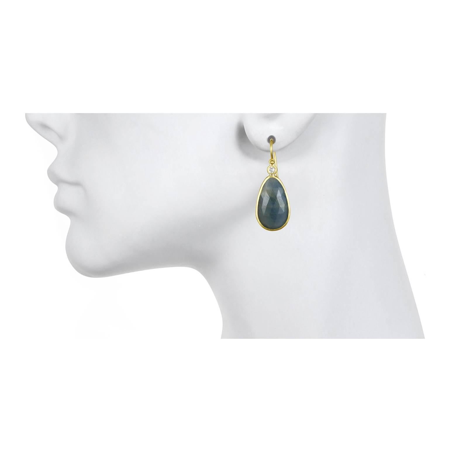 For those of us who appreciate and covet items that are truly unique, these earrings are it!  Handcrafted in 18k green* gold, rose cut blue sapphire slices are bezel set and paired with bezel set diamonds. The diamonds contrast and add a sparkle to