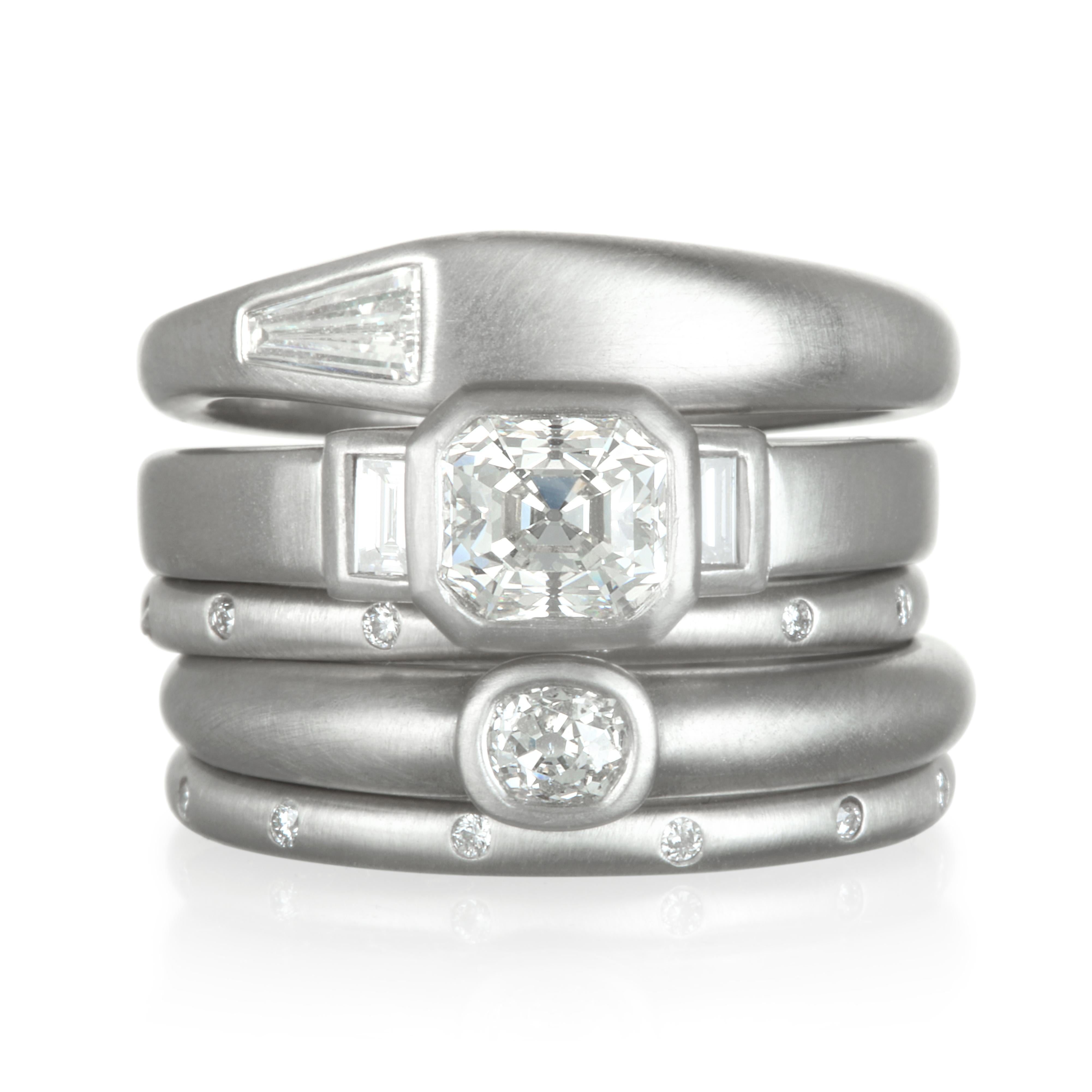 Faye Kim's handcrafted  Platinum diamond ring, set with an Old European Cut diamond is perfect on its own for the modern and minimalistic.  If you prefer to stack, layer it with diamond eternity bands to create our own unique style. 

Size