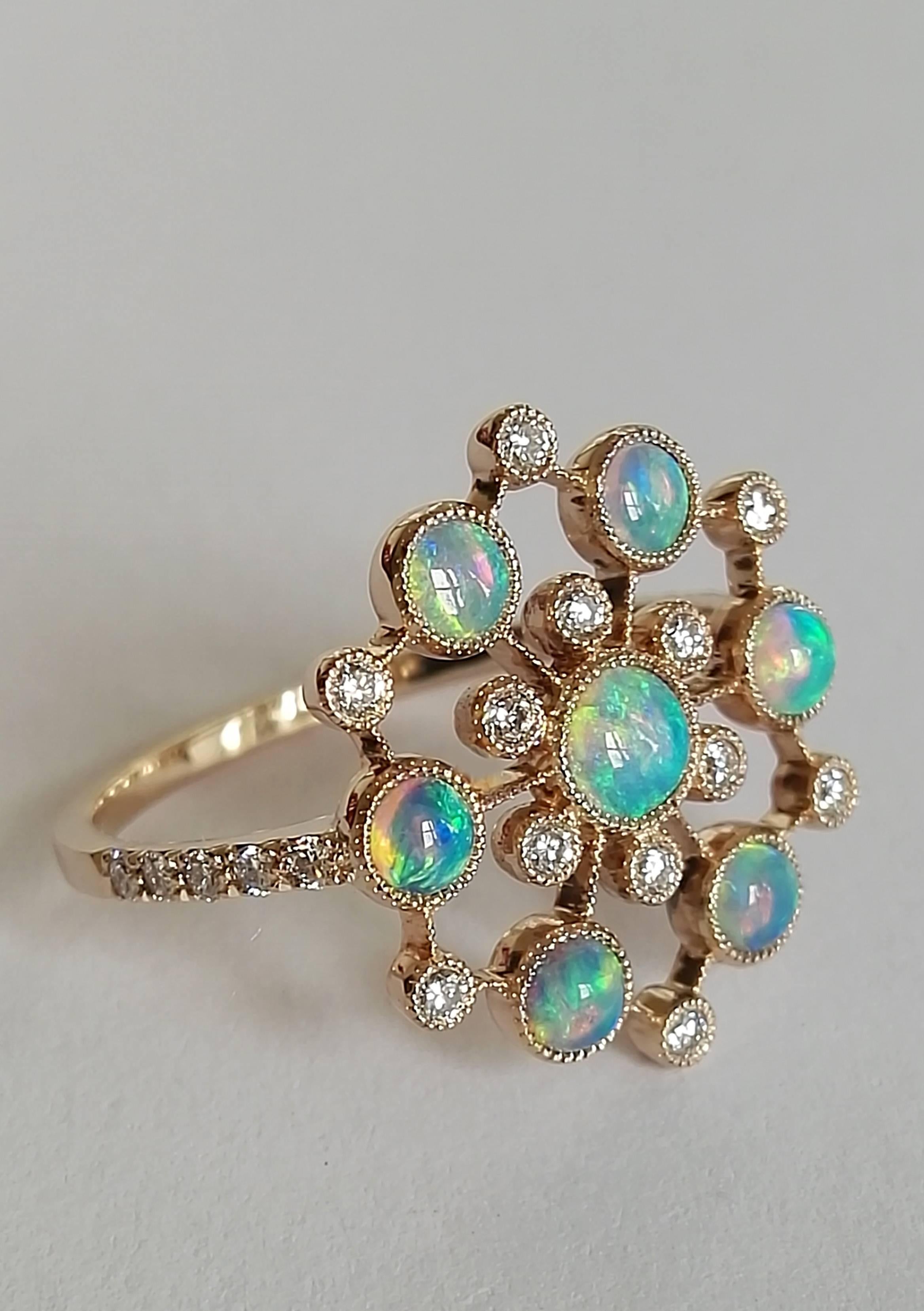 Dalben design Opal ring with 7 Australian Opals and 22 white round brillant cut Diamonds weighing 0,25 carats mounted in 18 kt warm white gold.  Ring size7 1/2 USA - 56 EU .  The Ring has been designed and handcrafted in our atelier in Como Italy