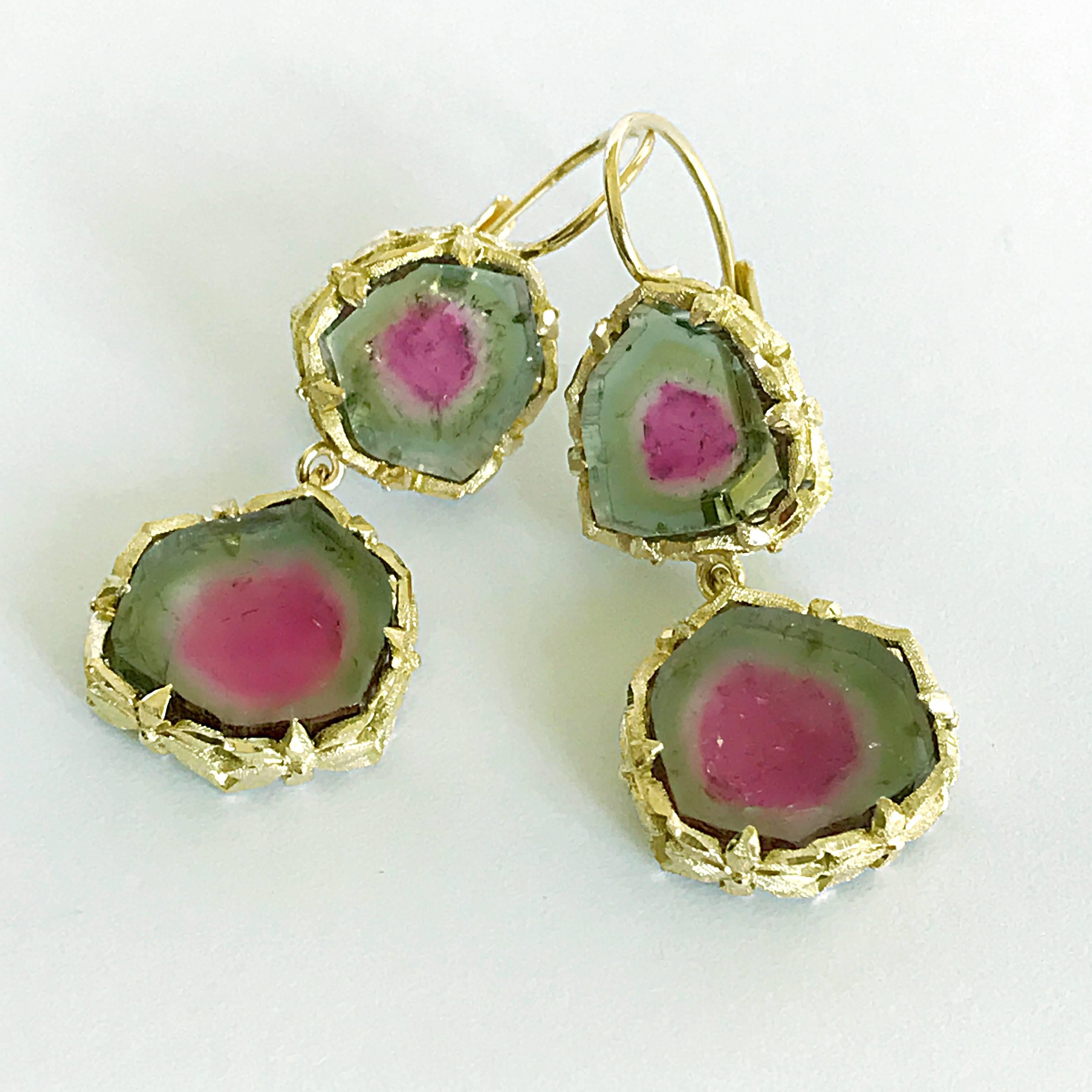 Dalben design 18 kt hand engraved yellow gold dangle earrings with four red-green watermelon  Tourmaline weighting 21,2 carat . 
Dimension: 
width 15 mm height without leverback 30 mm  
The earrings has been designed and handcrafted in our atelier