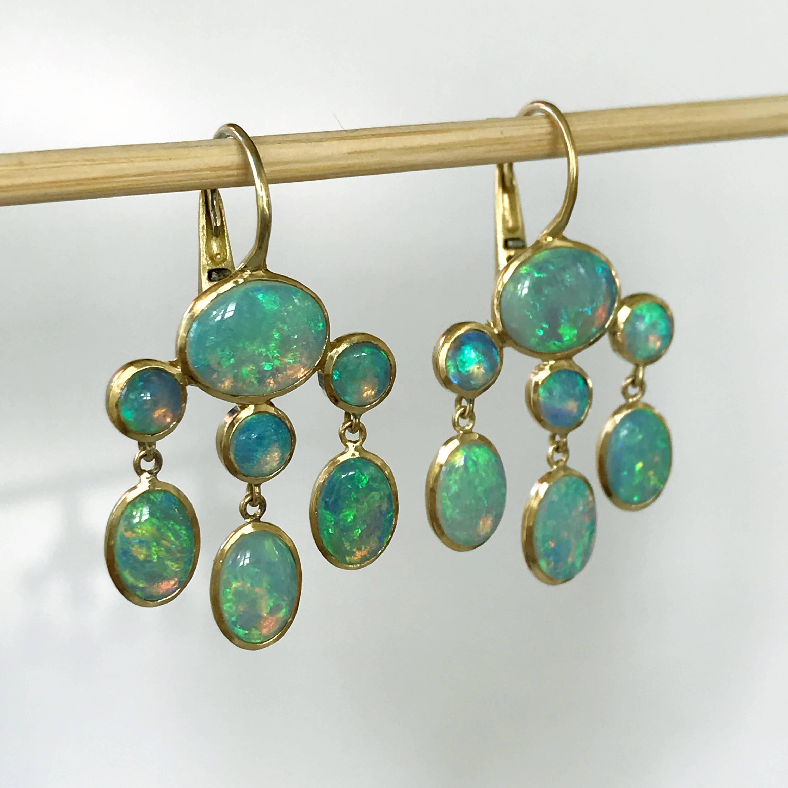 Dalben design 18k yellow gold semi lucid finishing earrings with 14 bezel set Australian Opals .  
Dimension: 
width 18,8 mm height without leverback 23 mm  
The earrings has been designed and handcrafted in our atelier in Como Italy with a rigorous