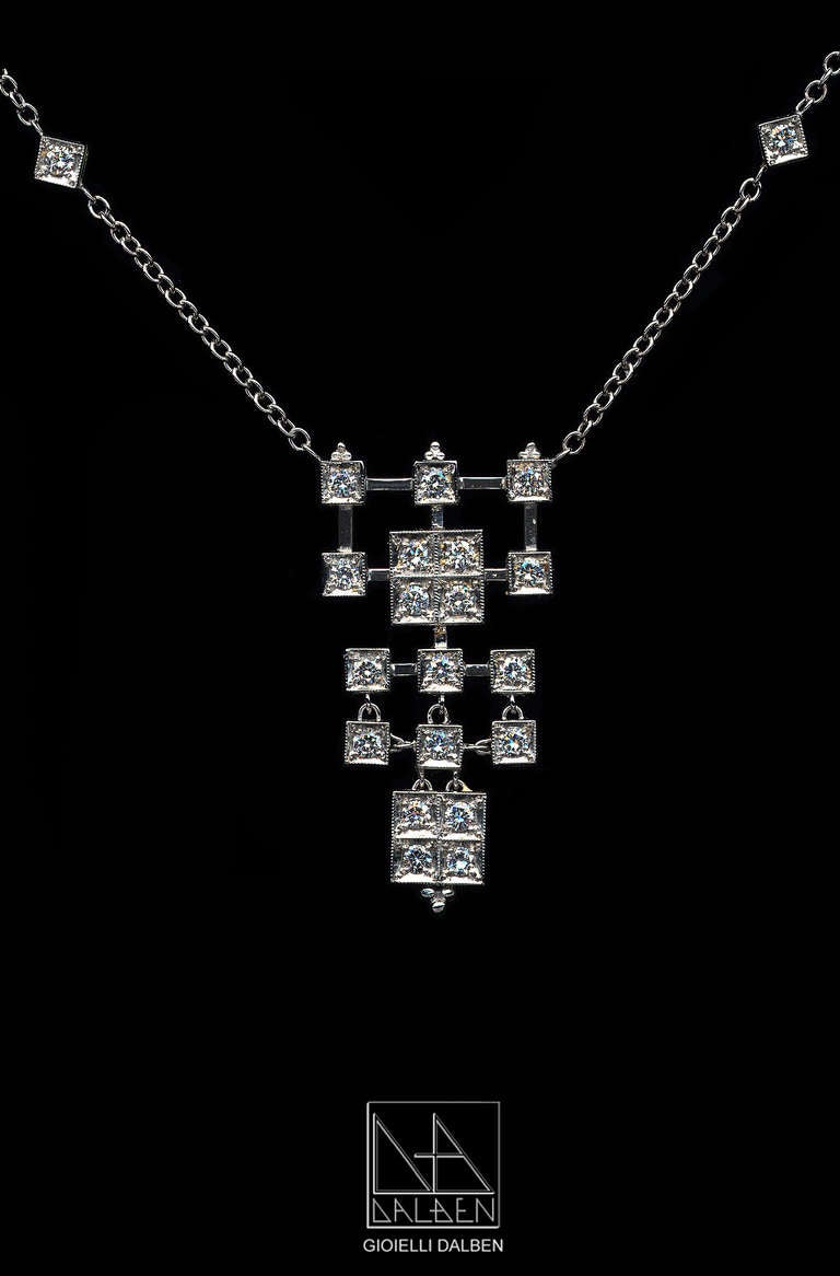 Dalben design Diamonds Pendant Necklace
mounted in 18 kt white gold.
Round brillant cut white Diamonds F-G color and VS clarity weighting 1,15 carats.
The necklace is completely hand made in Italy Como with a rigorous quality workmanship .
Chain