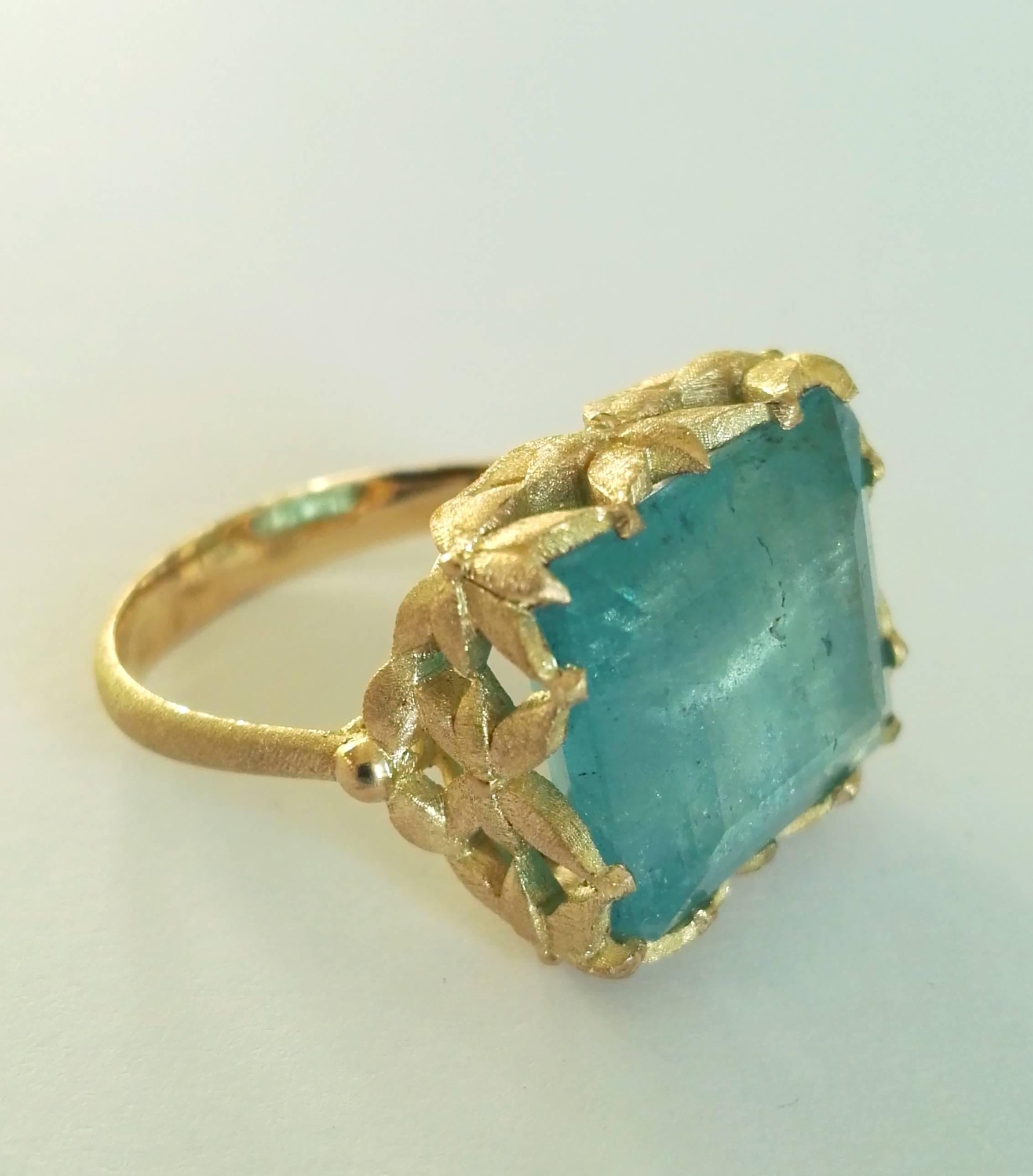 Dalben design 18 kt engraved yellow gold Cocktail Ring with an Emerald cut Aquamarine weighting 8,40 carat .  
Ring size 7  USA - 54 EU resizable to most finger sizes.  
The Ring has been designed and handcrafted in our atelier in Italy Como with