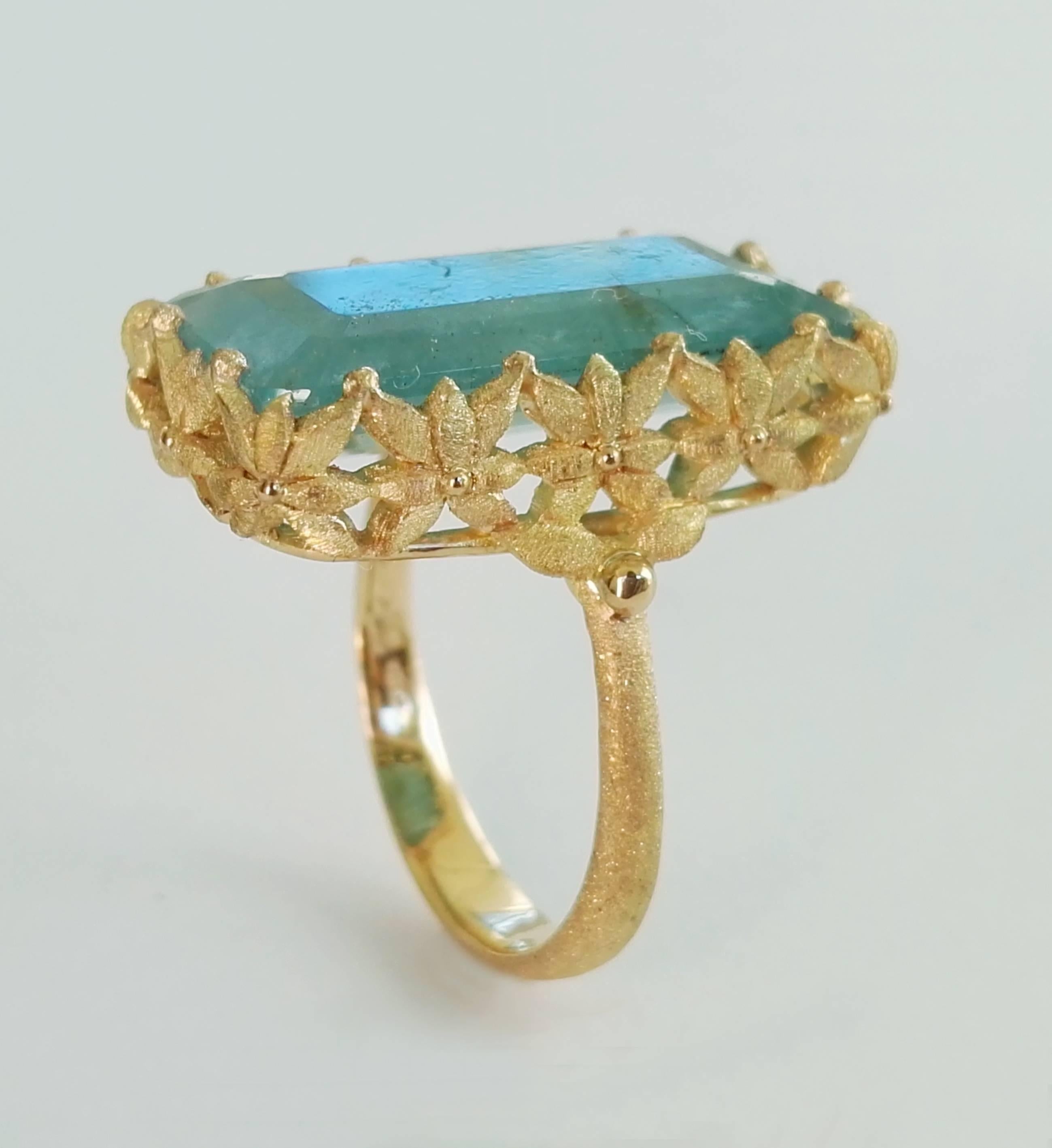 Dalben design 18 kt engraved yellow gold Cocktail Ring with a Rectangular cut Aquamarine weighting 9,10 carat .  Ring size 7 USA - 54 EU resizable to most finger sizes.  The Ring has been designed and handcrafted in our atelier in Italy Como with a