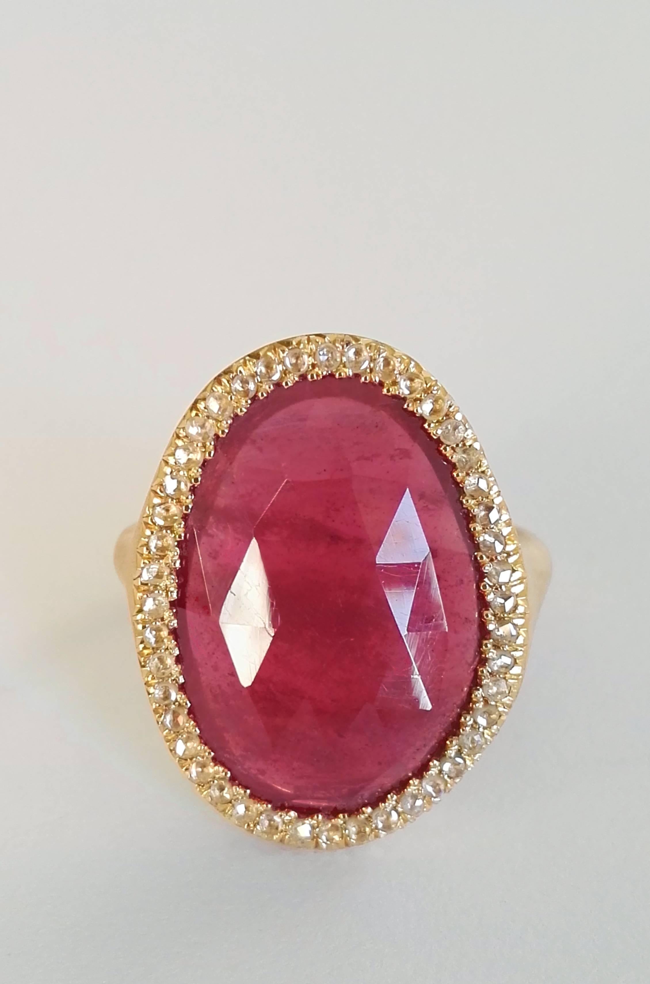 Dalben design one of a kind 18k yellow gold satin finishing ring with a 11,08 carat bezel-set faceted treated red sapphire  surrounded by 0,32 carat rose cut diamonds. .
Bezel stone dimensions : width 0,72 inch (18,40 mm) height 0,92 inch (23,50