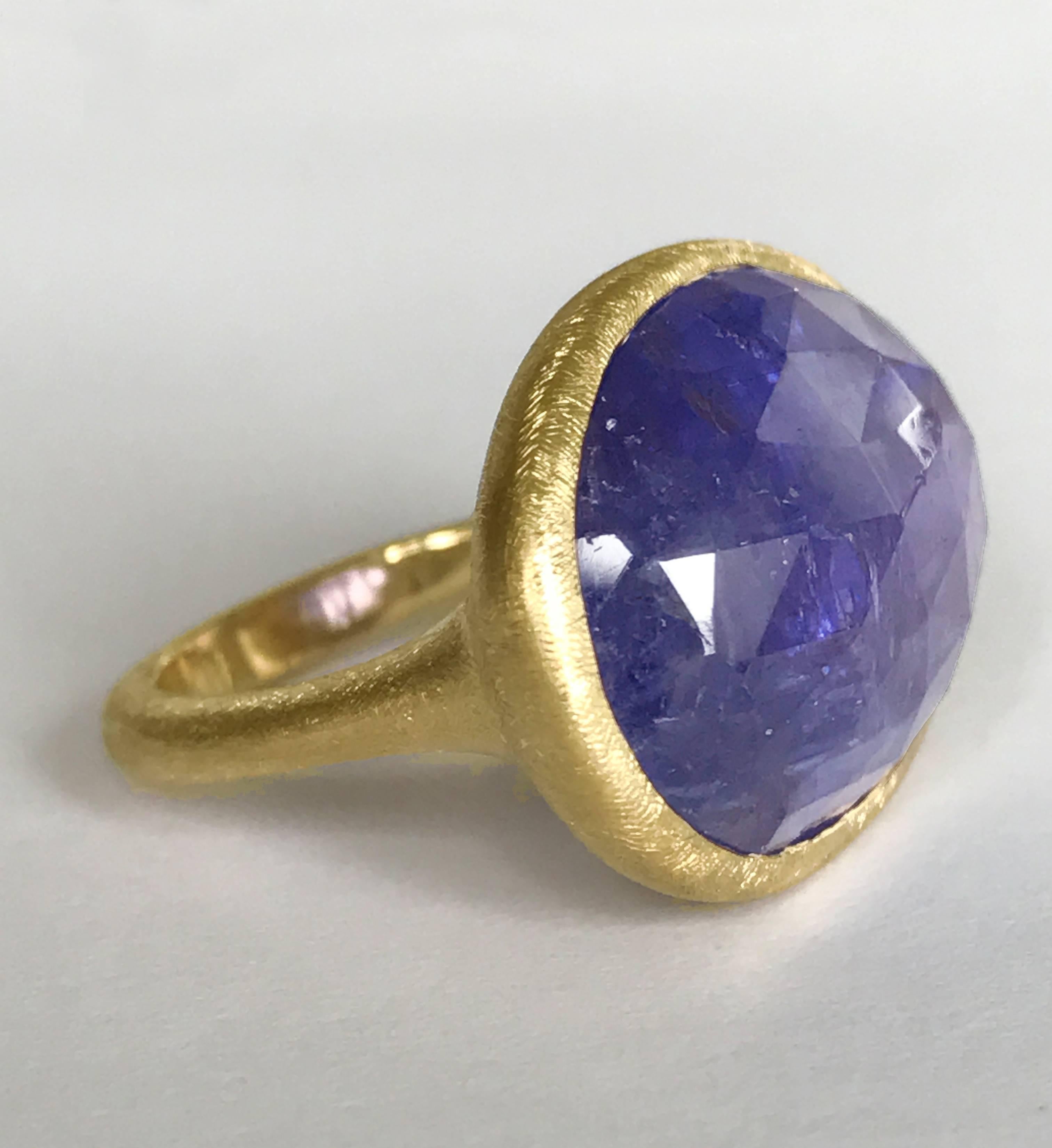 Dalben design One of a Kind 18k yellow gold scratch handmade finishing ring with a 19,64 carat bezel-set faceted Tanzanite.  Ring size 6 3/4 - EU 54 re-sizable to most finger sizes. 
Bezel stone dimensions :  
width 23,24 mm  
height 17,50 mm 
The