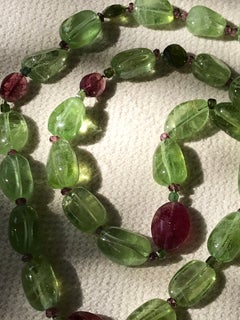 Collana in oro rosa con peridoto, tormalina e dalben