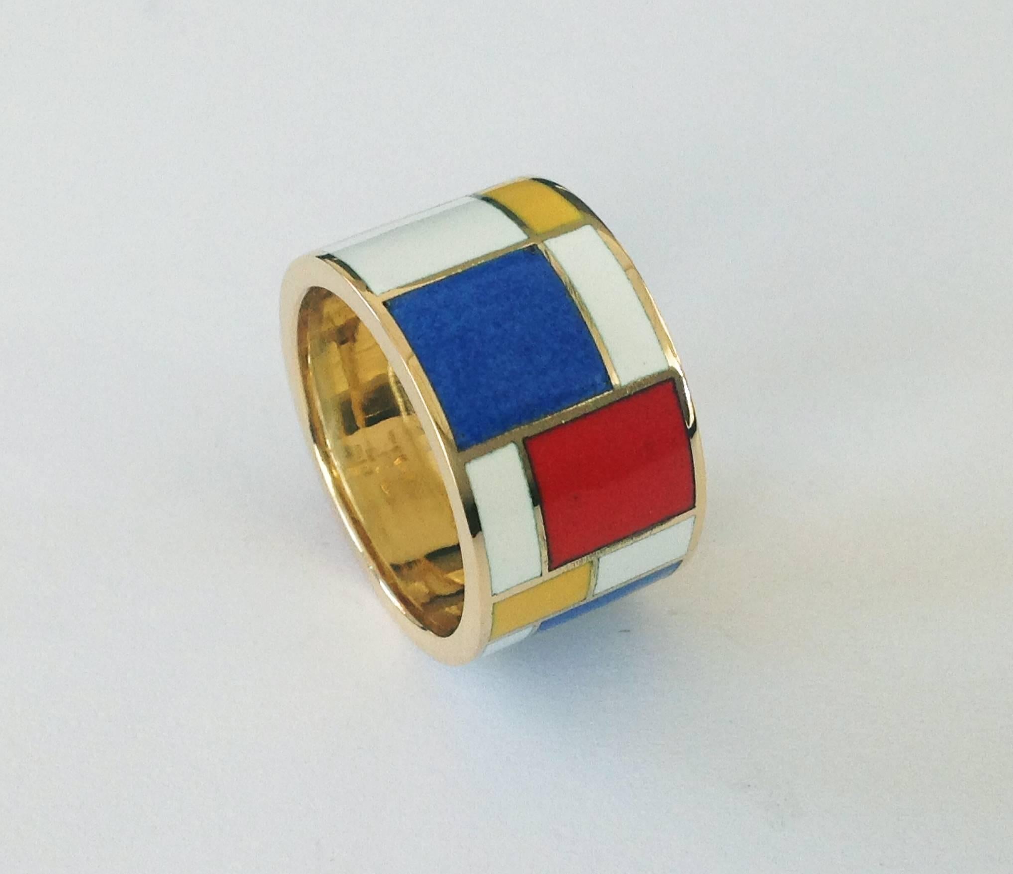 Dalben design fire Enamel and 18 k yellow gold unisex band ring inspired by Mondrian paintings.
Height 0,47 inch (12 mm), ring size 7 1/4 USA 55 EU .
For other size the ring requires four week from order to be custom-made size.
The ring is