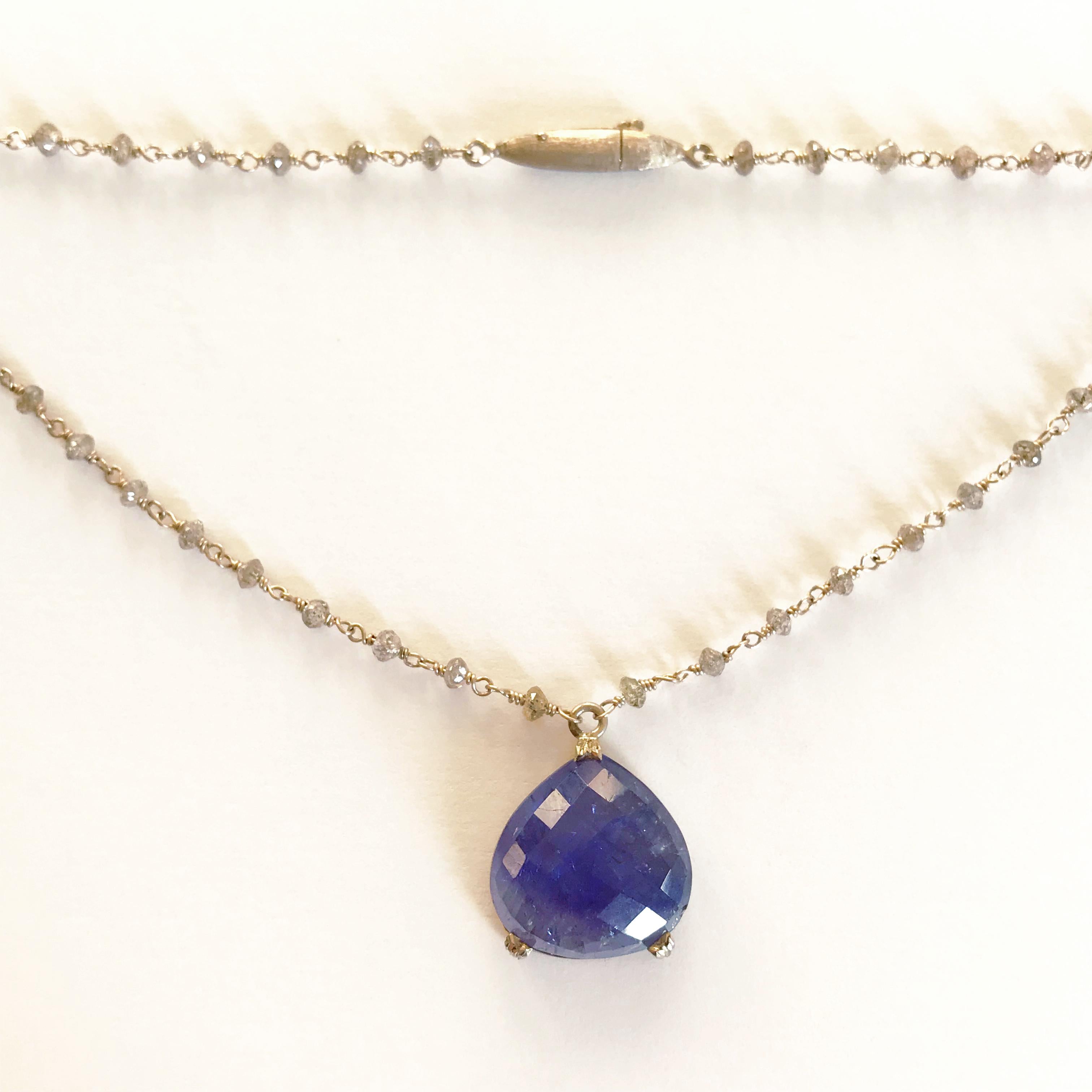 Dalben design hand crafted necklace composed of a drop shape tanzanite mounted on a white gold18k rosary-style chain with faceted light brown diamond beads  spaced at even intervals . 
Brown Diamond beads dimension: 2,3 mm tot weight ct. 5,2
Pendent