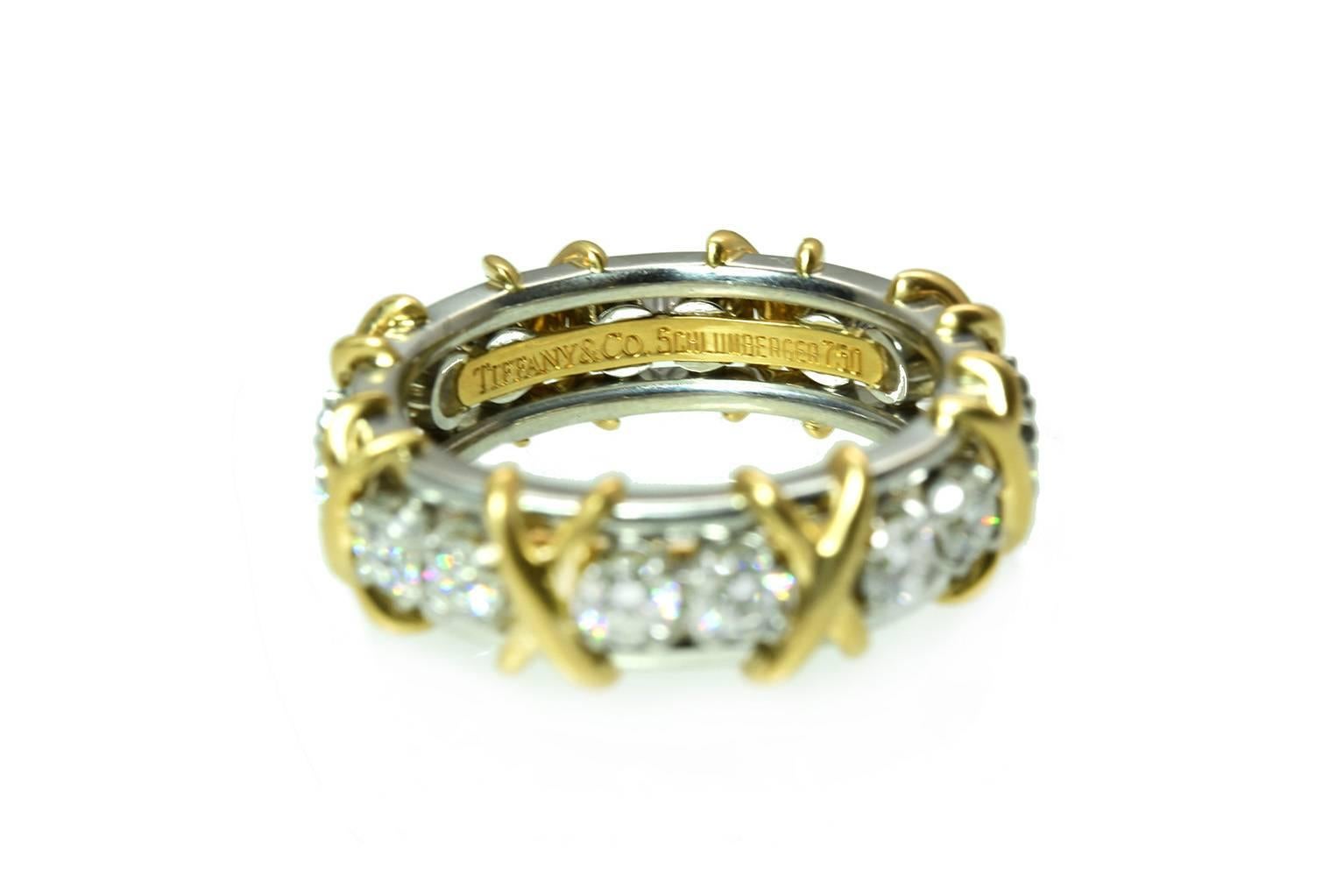 Tiffany X Diamond Band
16 Round Brilliant Diamonds approximately 1.12 carats total weight
18 Karat Yellow Gold/ Platinum
Ring Size 5.5