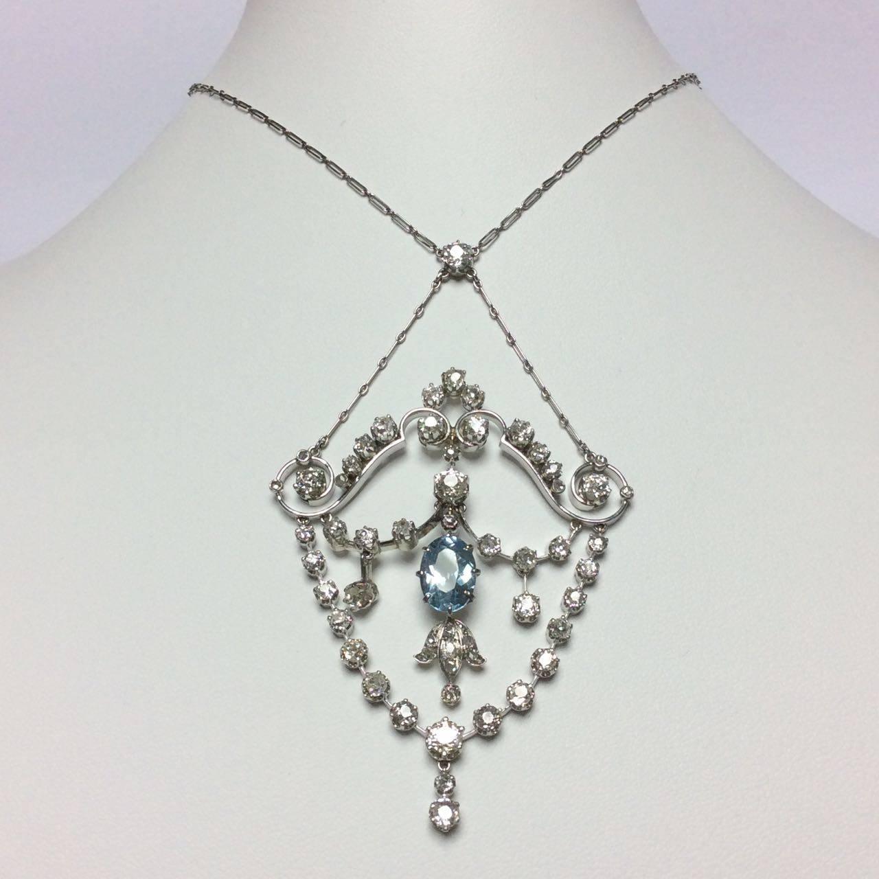 Platinum necklace set with aquamarine and diamonds brillant cut. Total diamond weight estimated at approximately 3.80 cts. French work Circa 1900.

