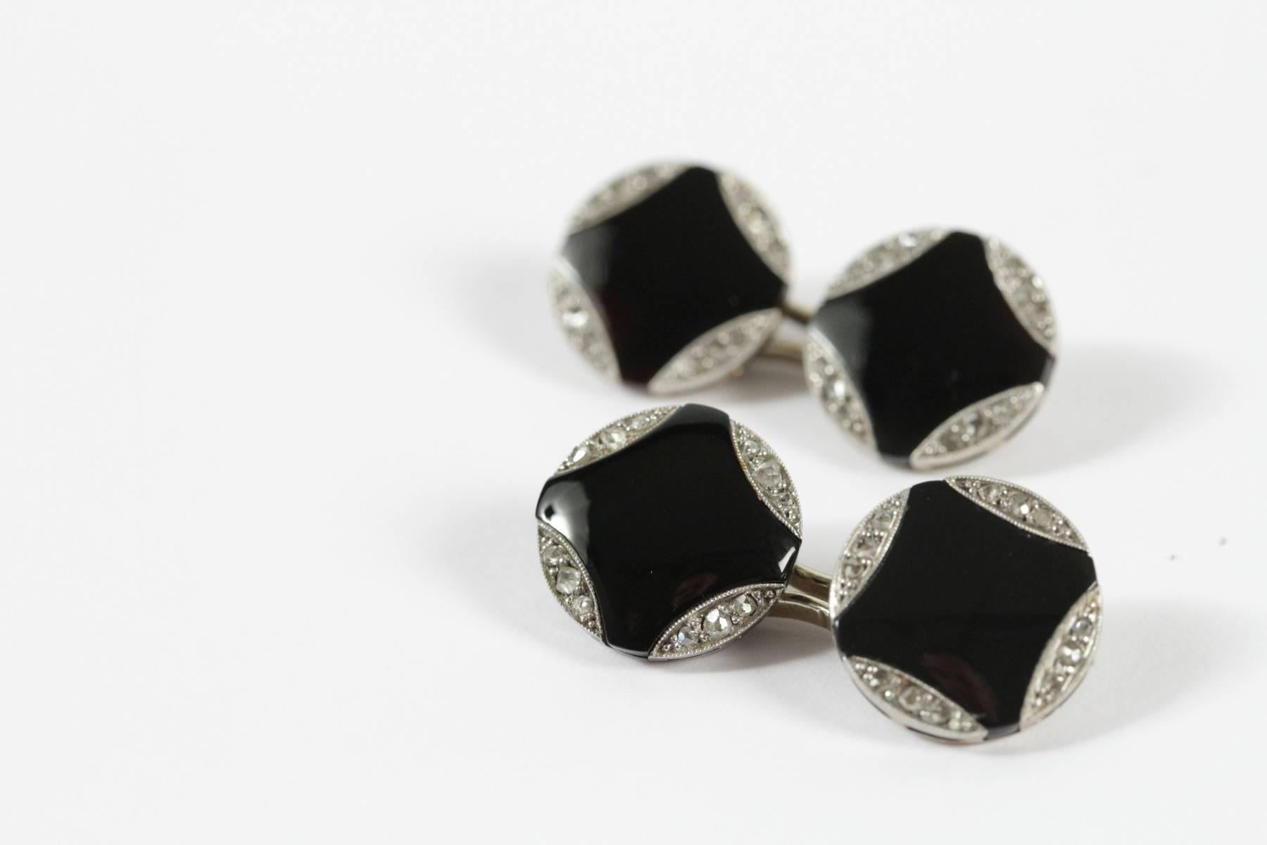 Pair of black onyx, rose cut diamonds and 18k gold cufflinks. French work. Circa 1930.