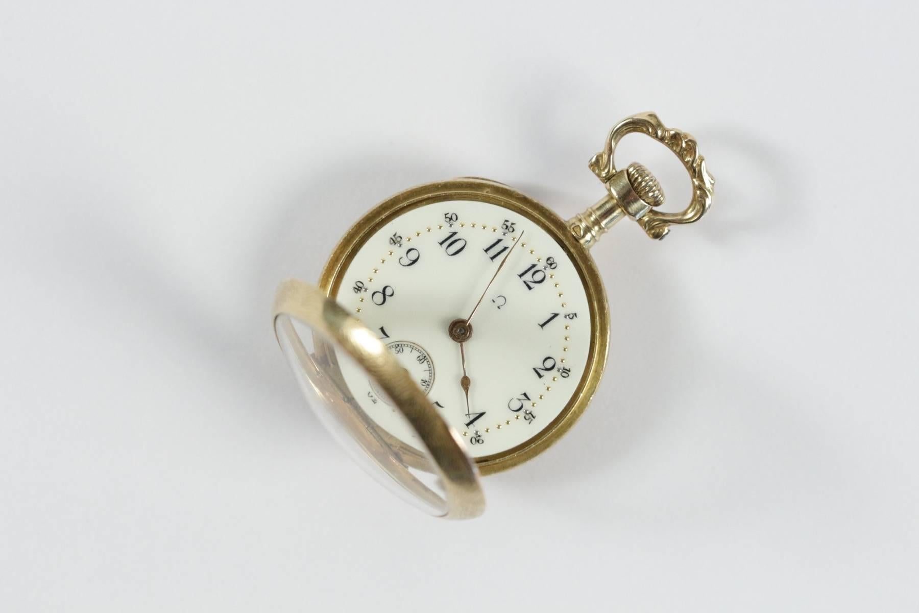 An Omega 18k yellow gold ladies pocket watch set with old mine cut diamond. Mechanical movement.