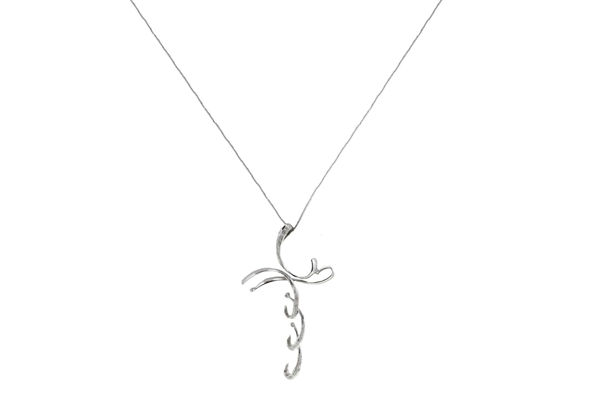 Elegant and stylized cross pendant in 18kt white gold embellished with diamonds.
tot weight 5.9gr
RF    G   FAAI
RK.AFCA85
Height Pendant 5.9 cm
Width Pendant 3.5 cm
Length Chain 45 cm


For any inquiries,please contact the seller through the