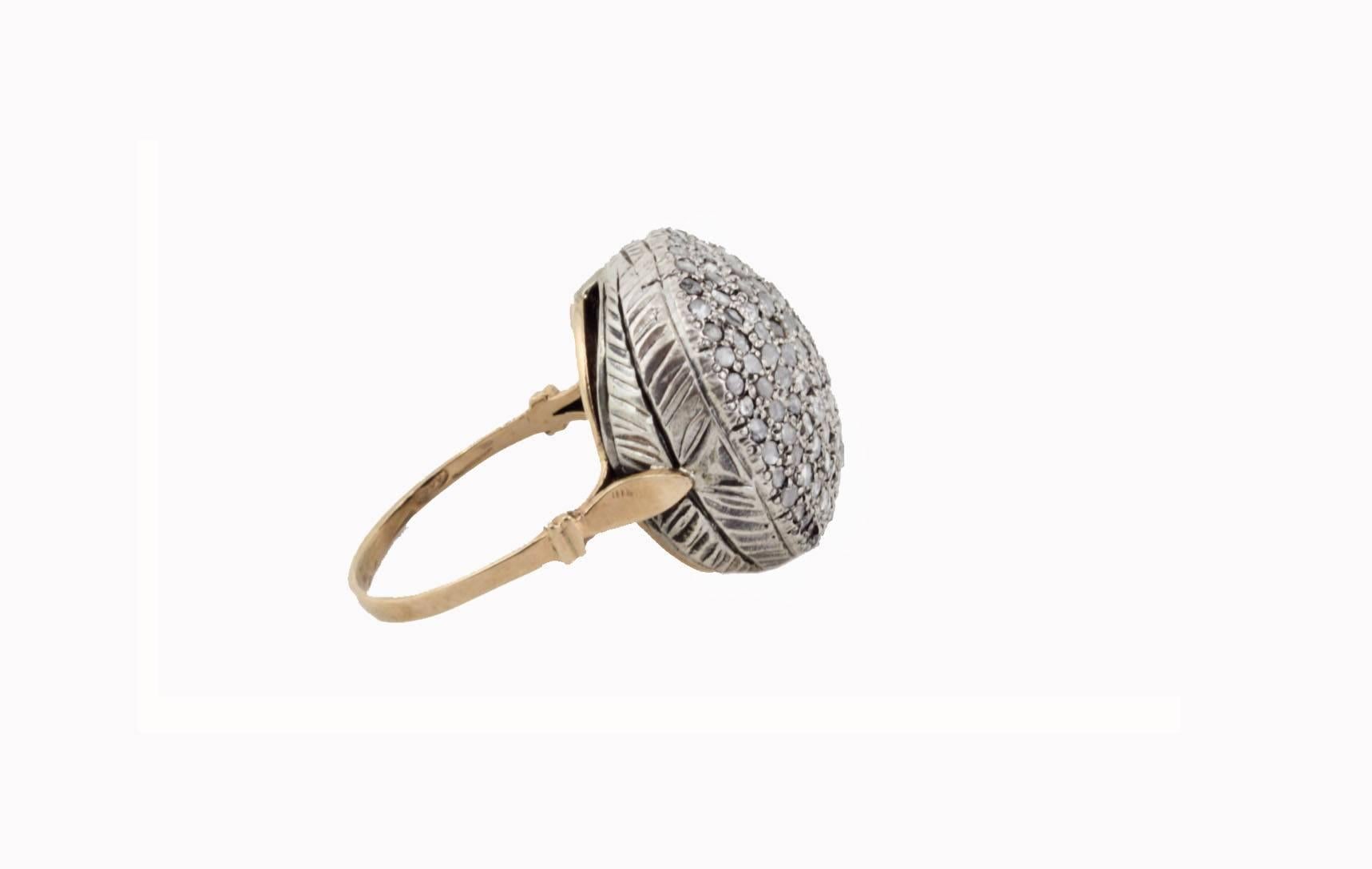 shipping policy: 
No additional costs will be added to this order.
Shipping costs will be totally covered by the seller (customs duties included). 


Shiny fashion ring , composed of diamonds all is mounted in 9 Kt rose gold and silver.
Ring Size