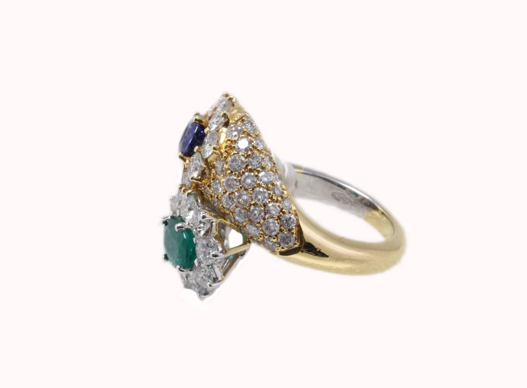 Shining and classic fashion ring composed of a twist of diamonds divided in yellow gold and white gold on top of them a blue sapphire and an emerald. All is mounted in 14K yellow gold and 14K white gold.
Diamonds 4.52 ct
Emerald and Blue Sapphire