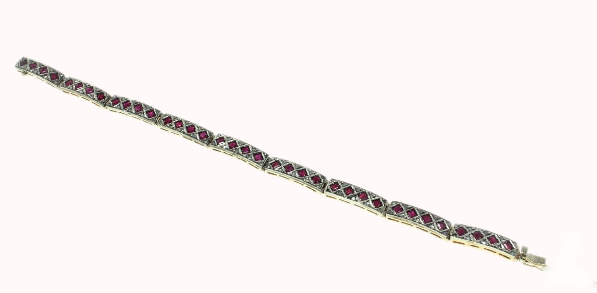Classic retro bracelet composed of rhombus shaped rubies surrounded of diamonds. All is mounted in 14 Kt rose gold and silver.
Tot weight  18.9 g
Rubies 4.41 ct
Diamonds 0.63 ct

Rf. giar